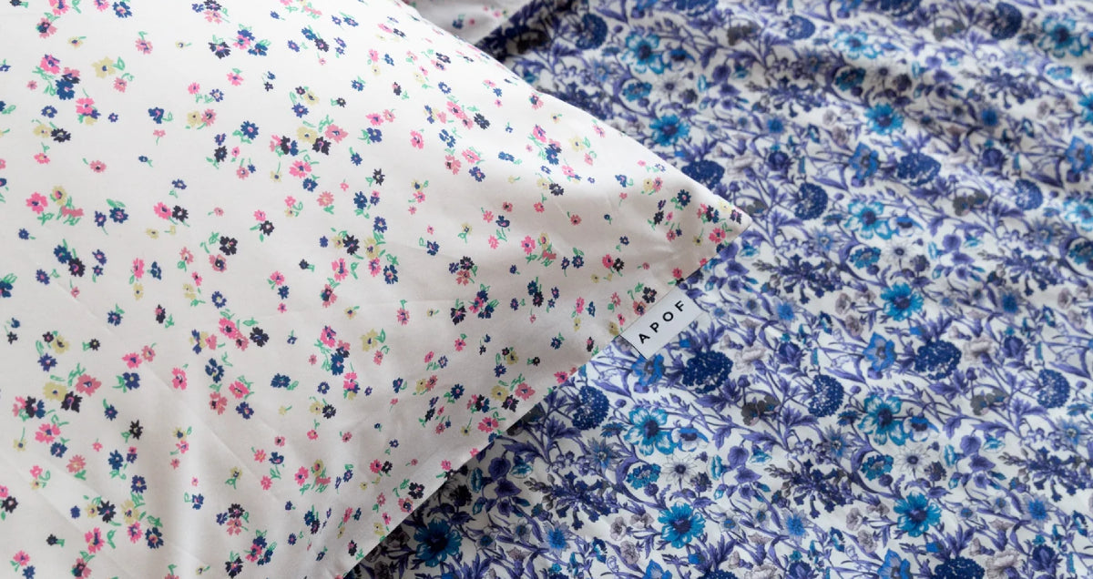 Floral patterned liberty cotton bedding in blue and white
