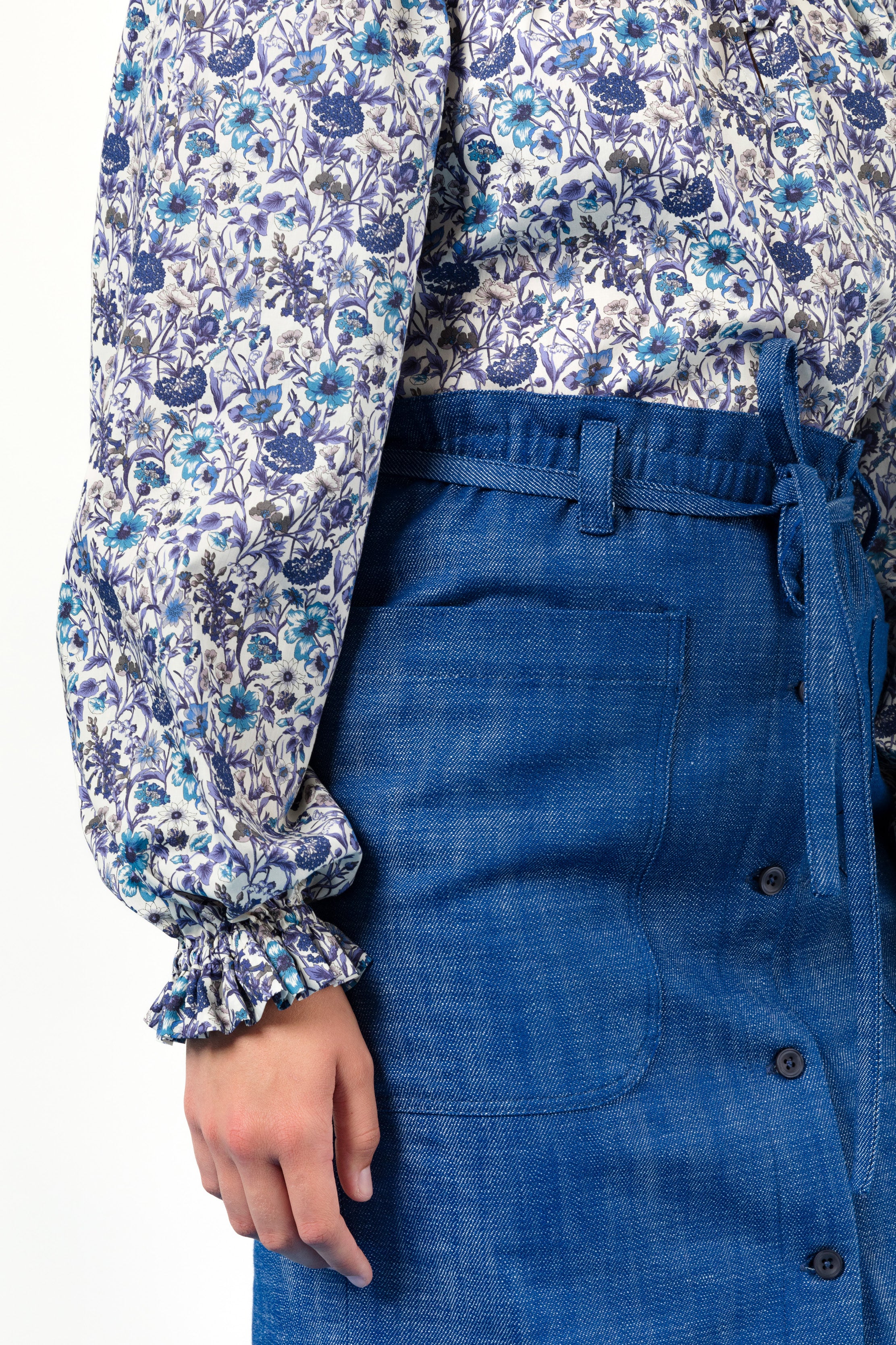 Shirt with blue flowers and blue denim skirt