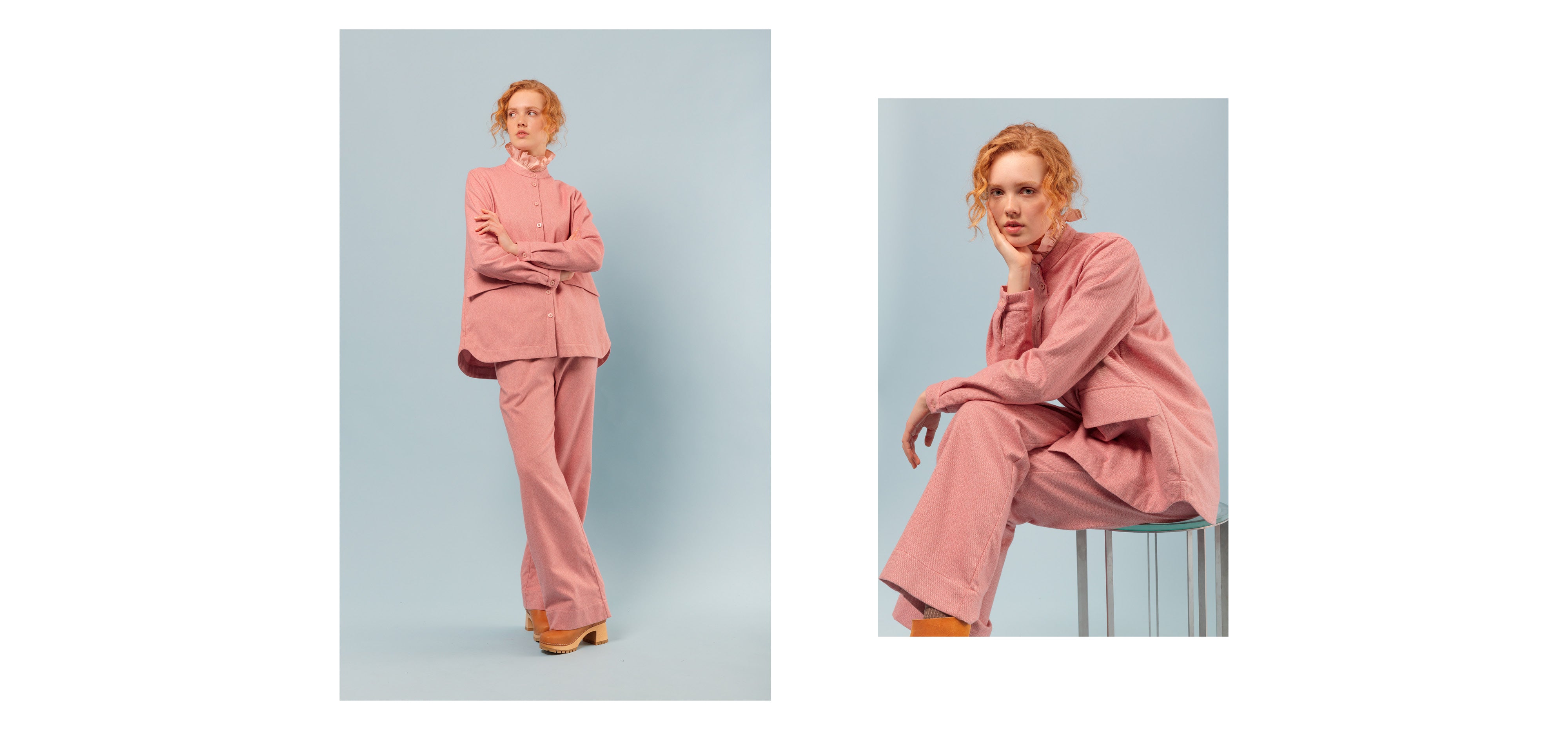 Woman in pink pants and jacket and pink shirt with frilled collar