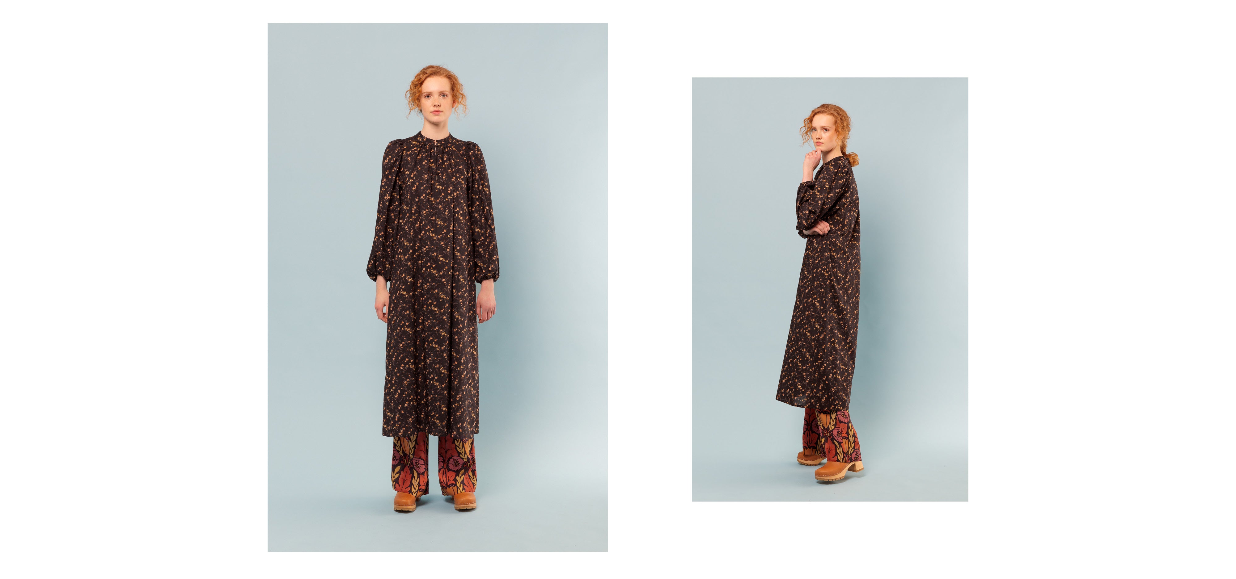 Woman in long caftan dress in liberty floral print cotton and patterned trousers
