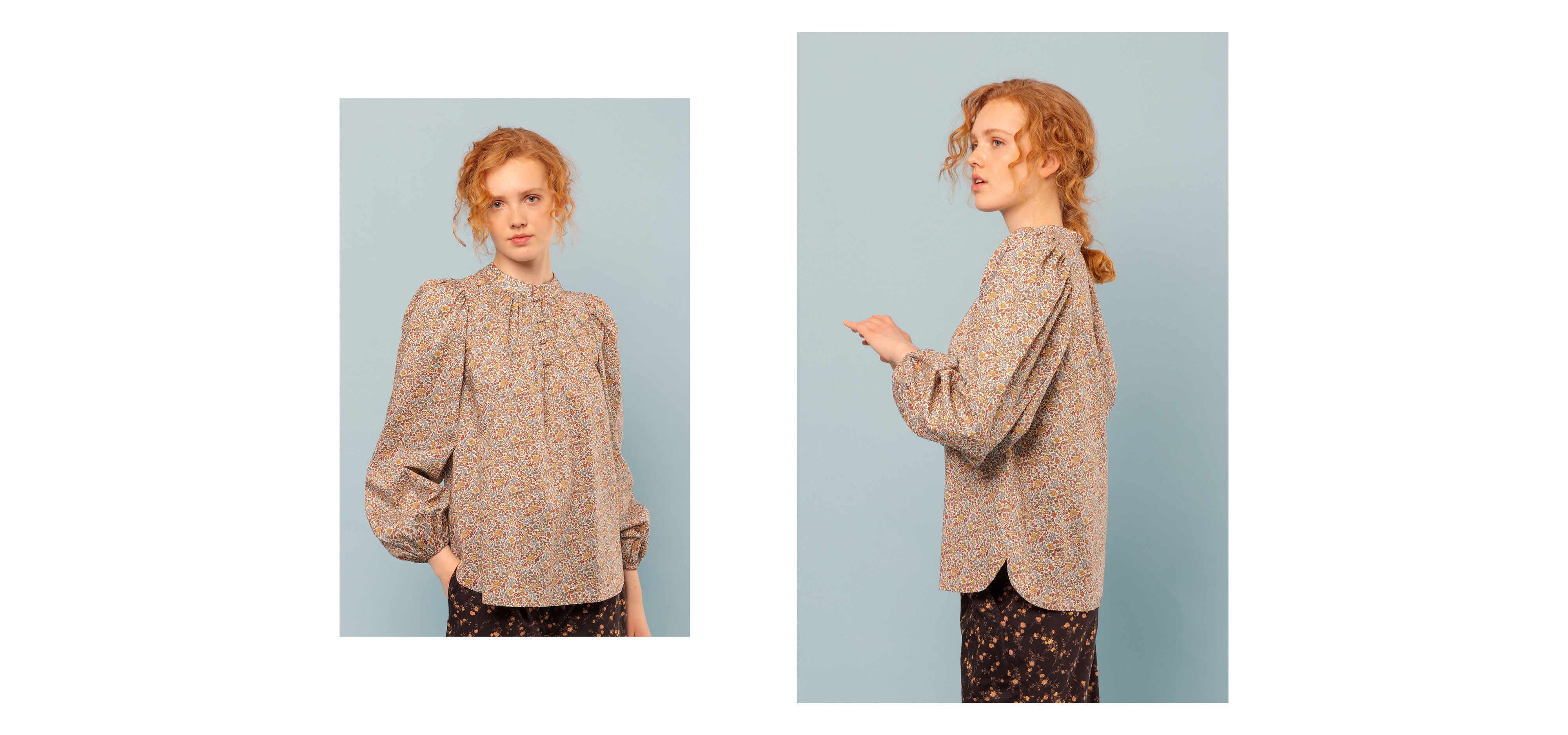 Woman in Liberty floral print pants with brown colors and shirt with puffed long sleeves