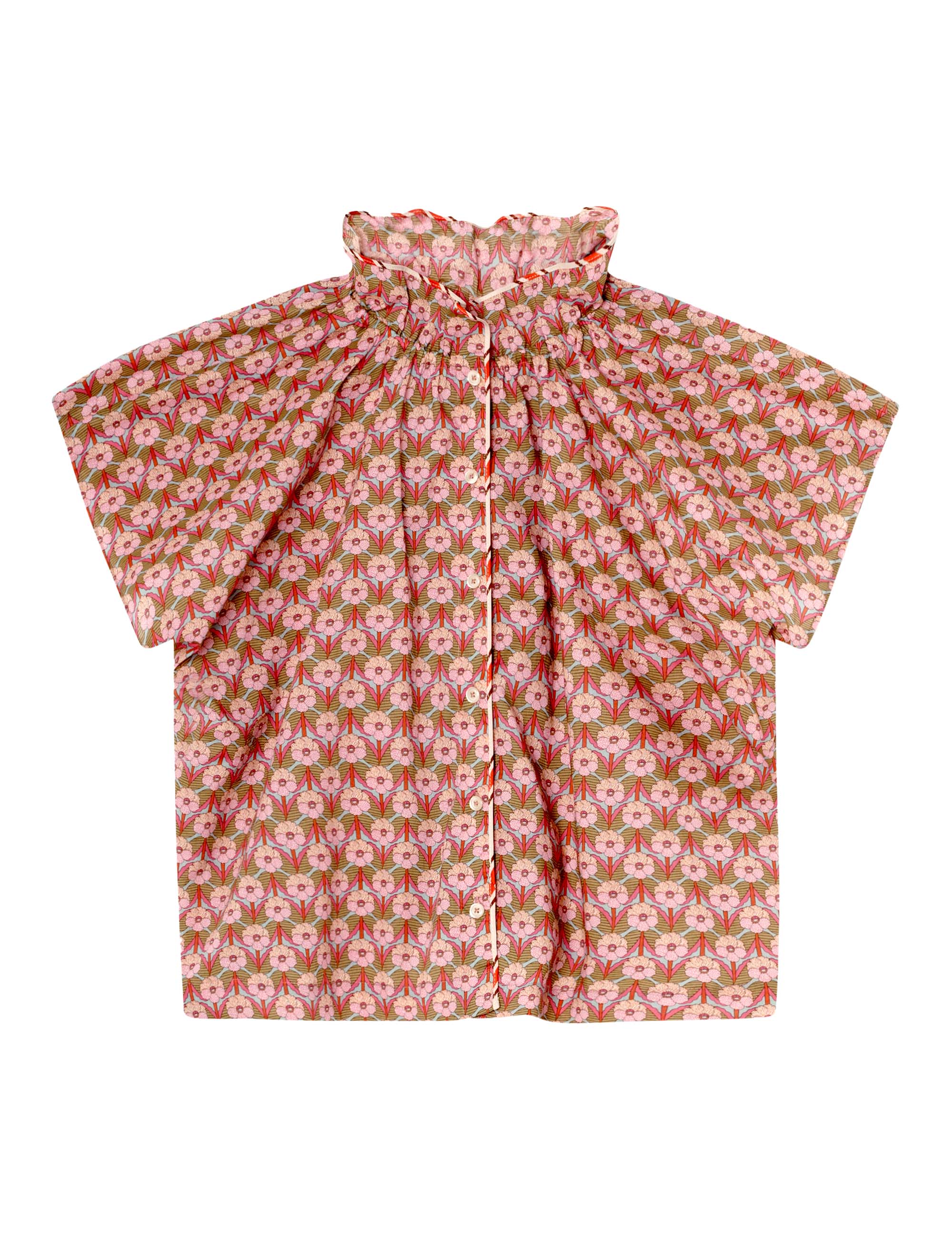Woman in short sleeved blouse with stand collar, buttons and pink floral print