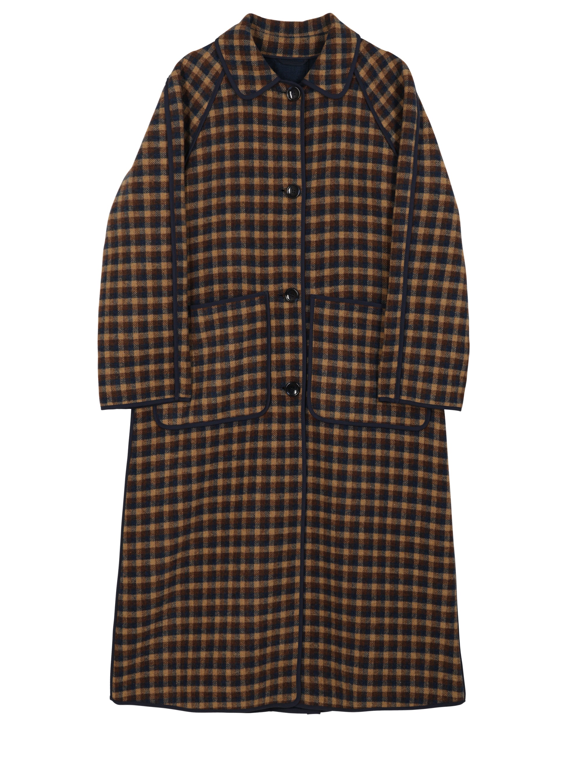 Women's check print wool coat with large buttons, pockets and collar wearing a beret