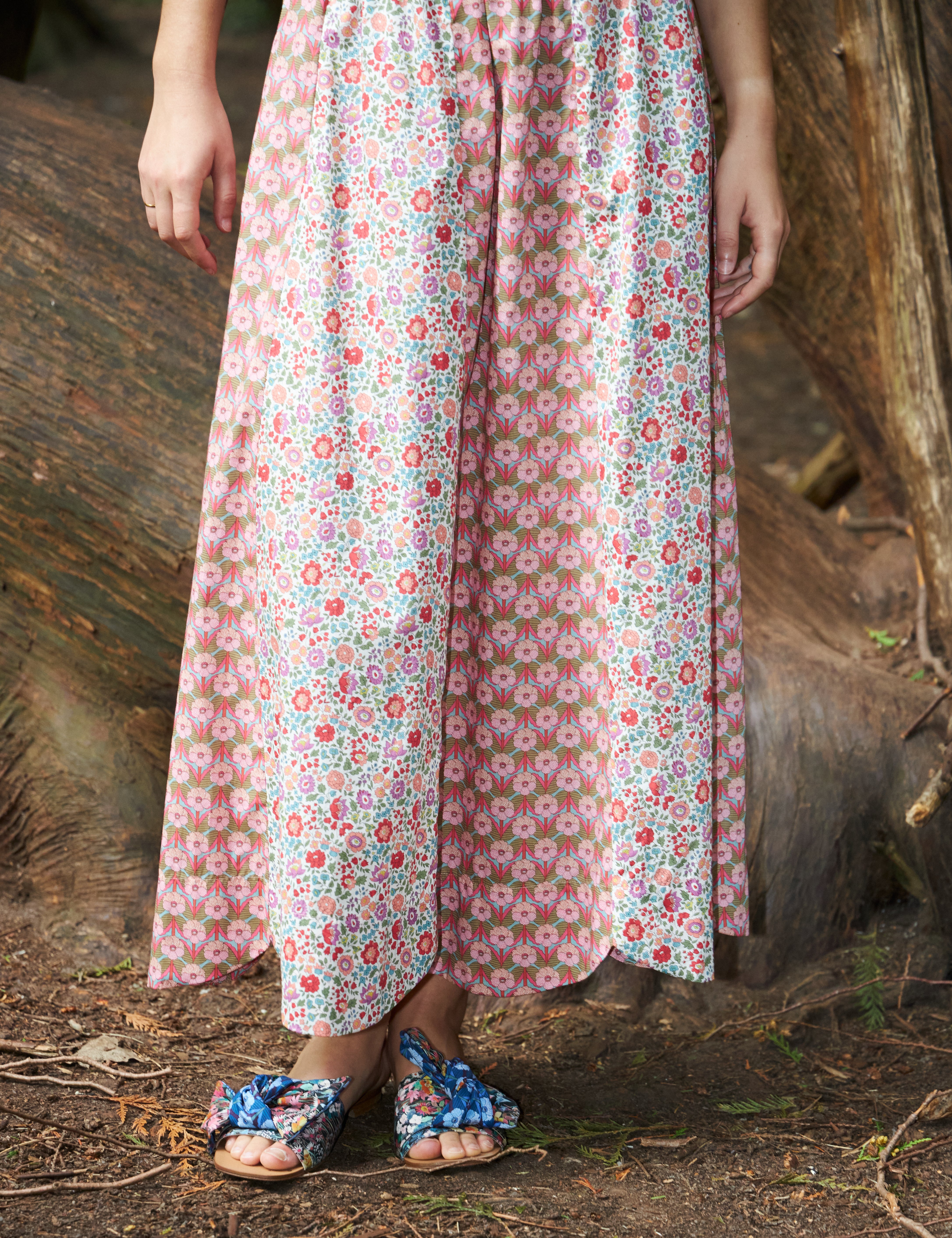 Maxi skirt with two different floral prints in pink red and green and sandals with blue floral patterned bows