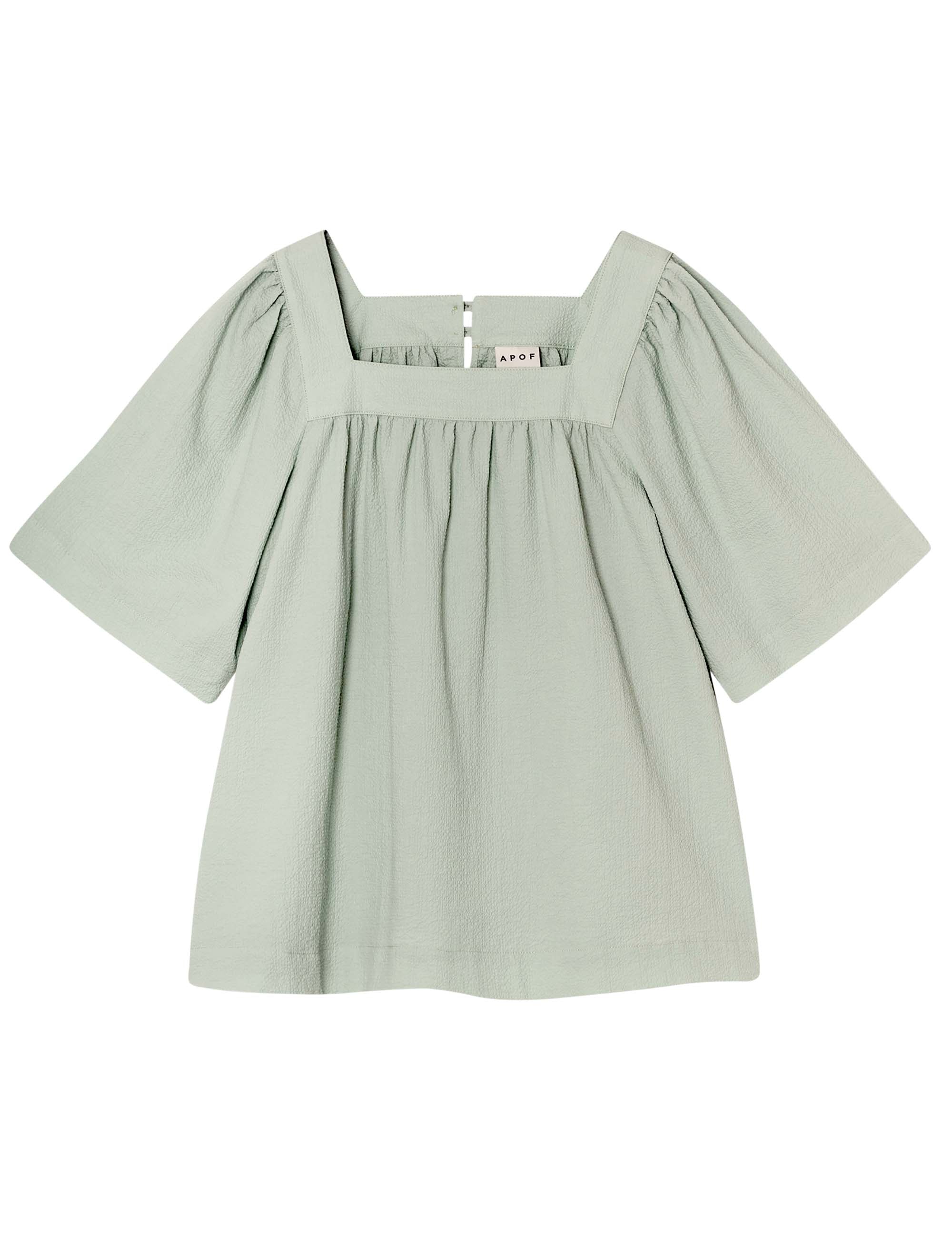 Light blue loose fit blouse with short sleeves