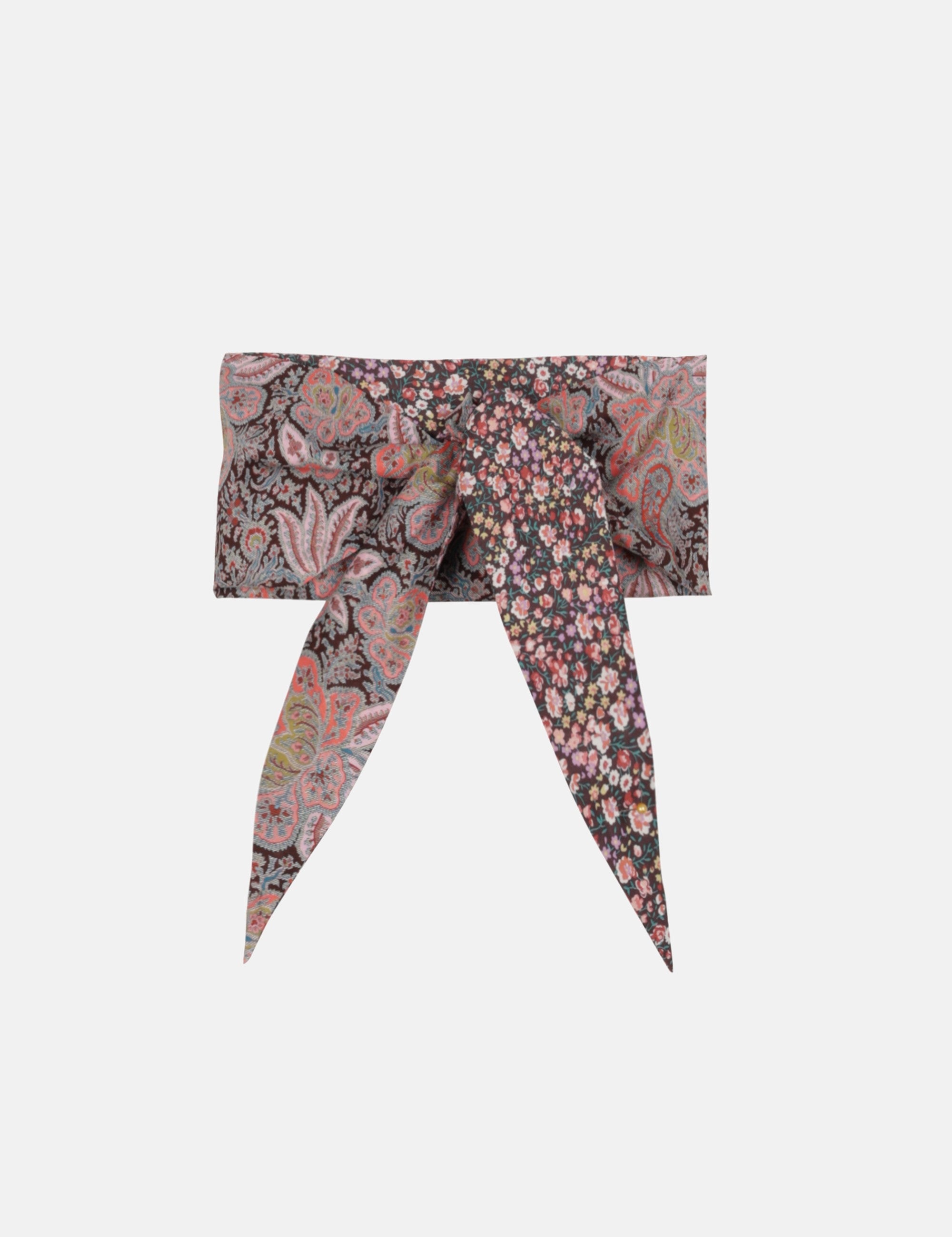 Floral and paisley patterned bow scarf with pointed ends in pink, red, and brown tones