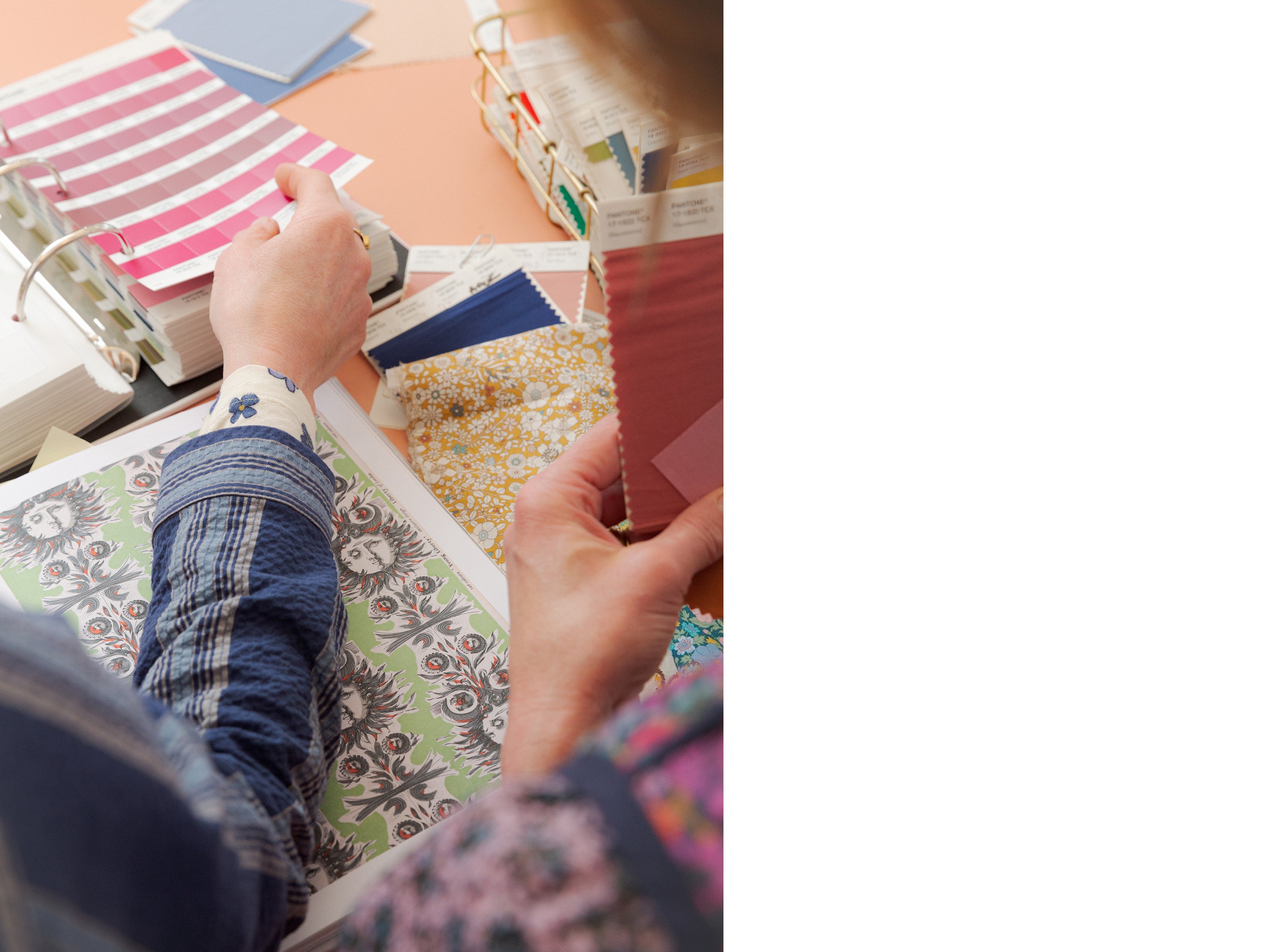 Hand holding fabric samples for women's fashion