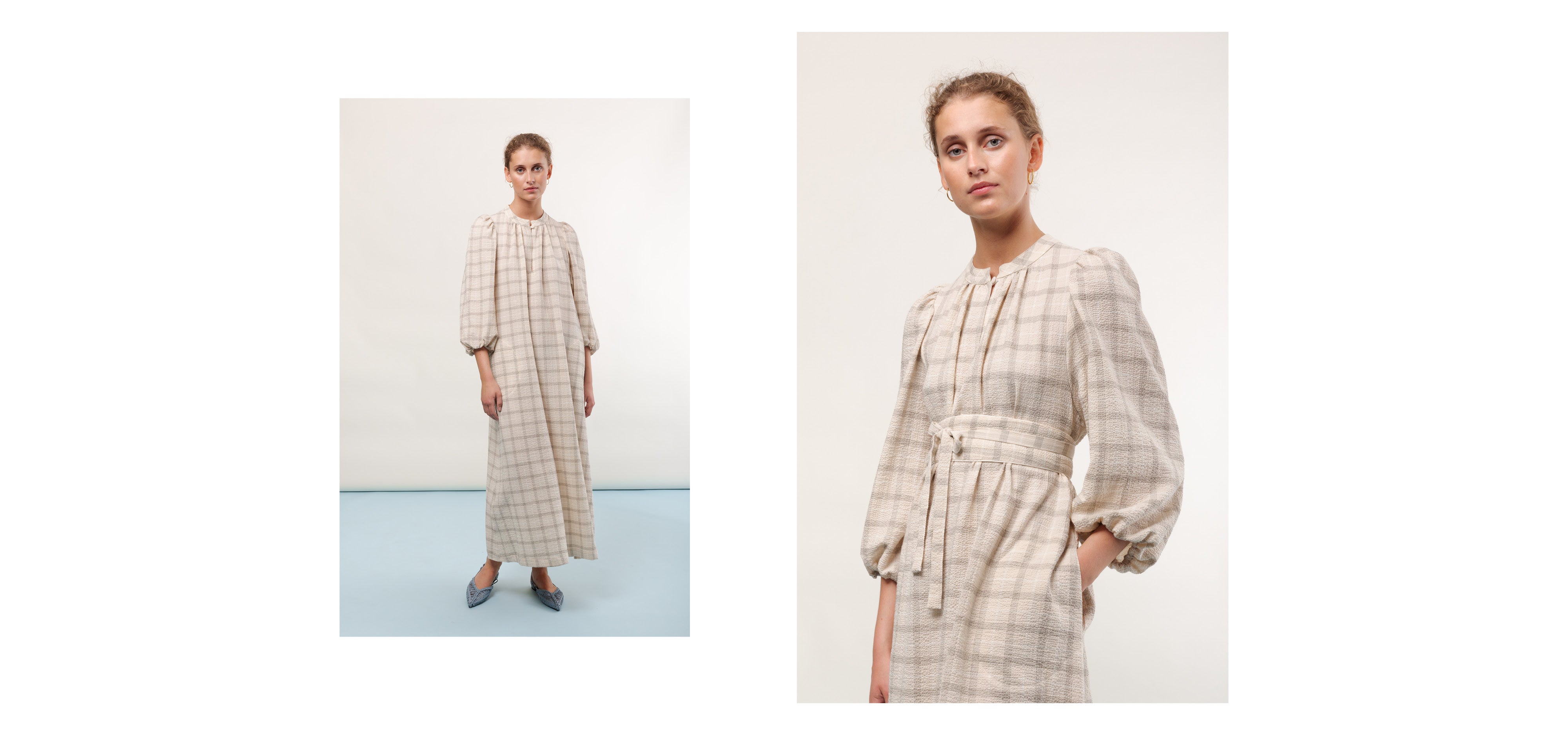 Woman in long beige checked dress with long puffed sleeves and belt
