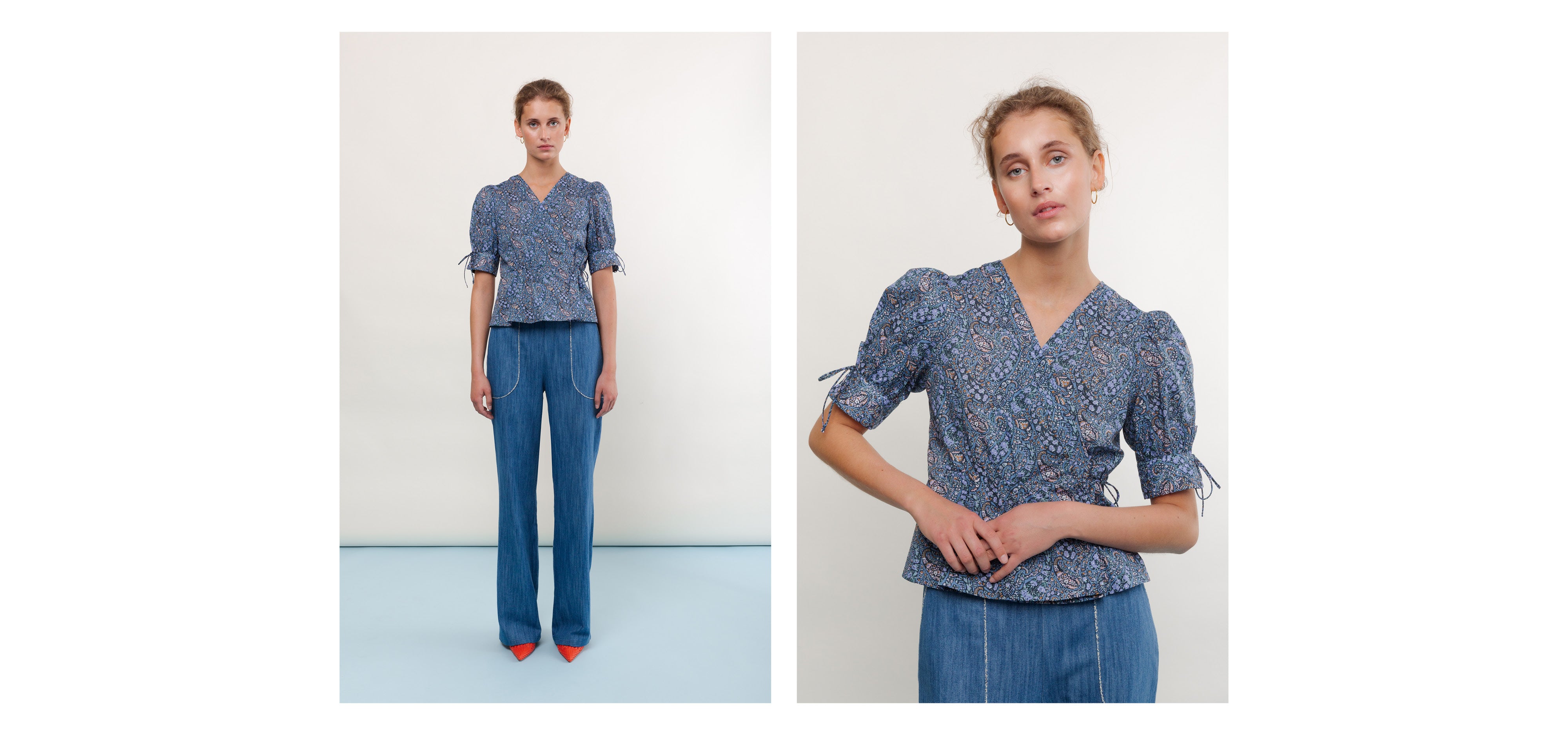 Woman in blue jeans and floral patterned shirt with short puffed sleeves