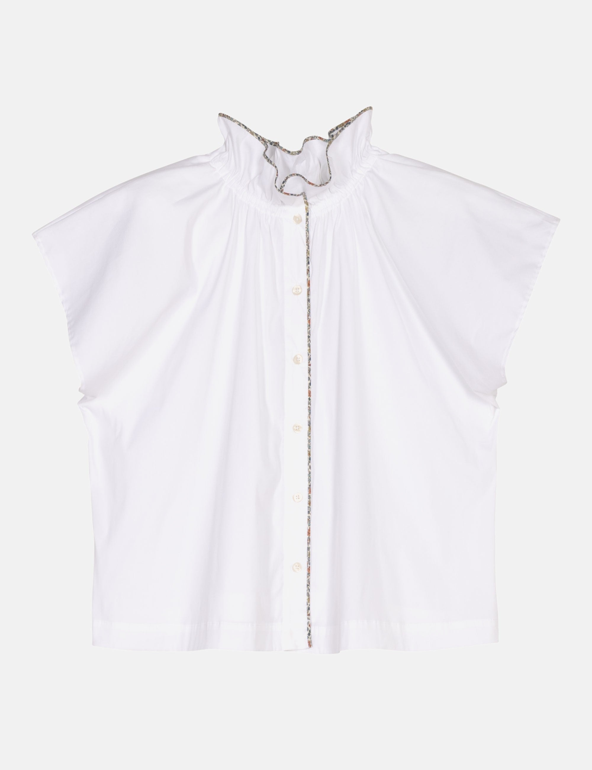 White blouse with ruffled collar and frilled stand collar
