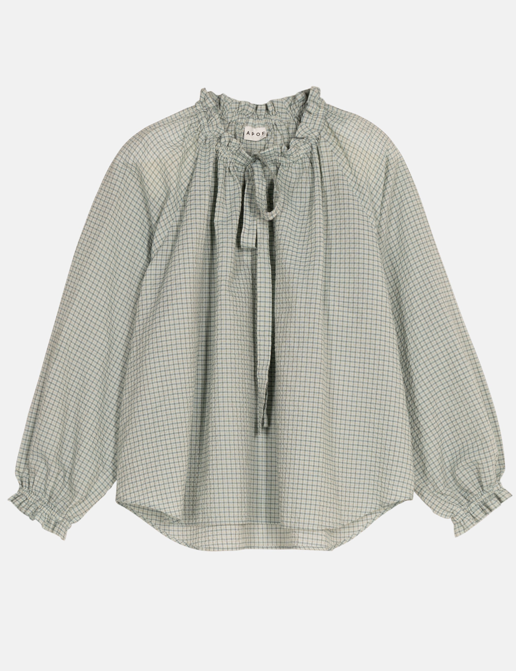 Green checkered blouse with long sleeves, ruffles and a bow on a white background