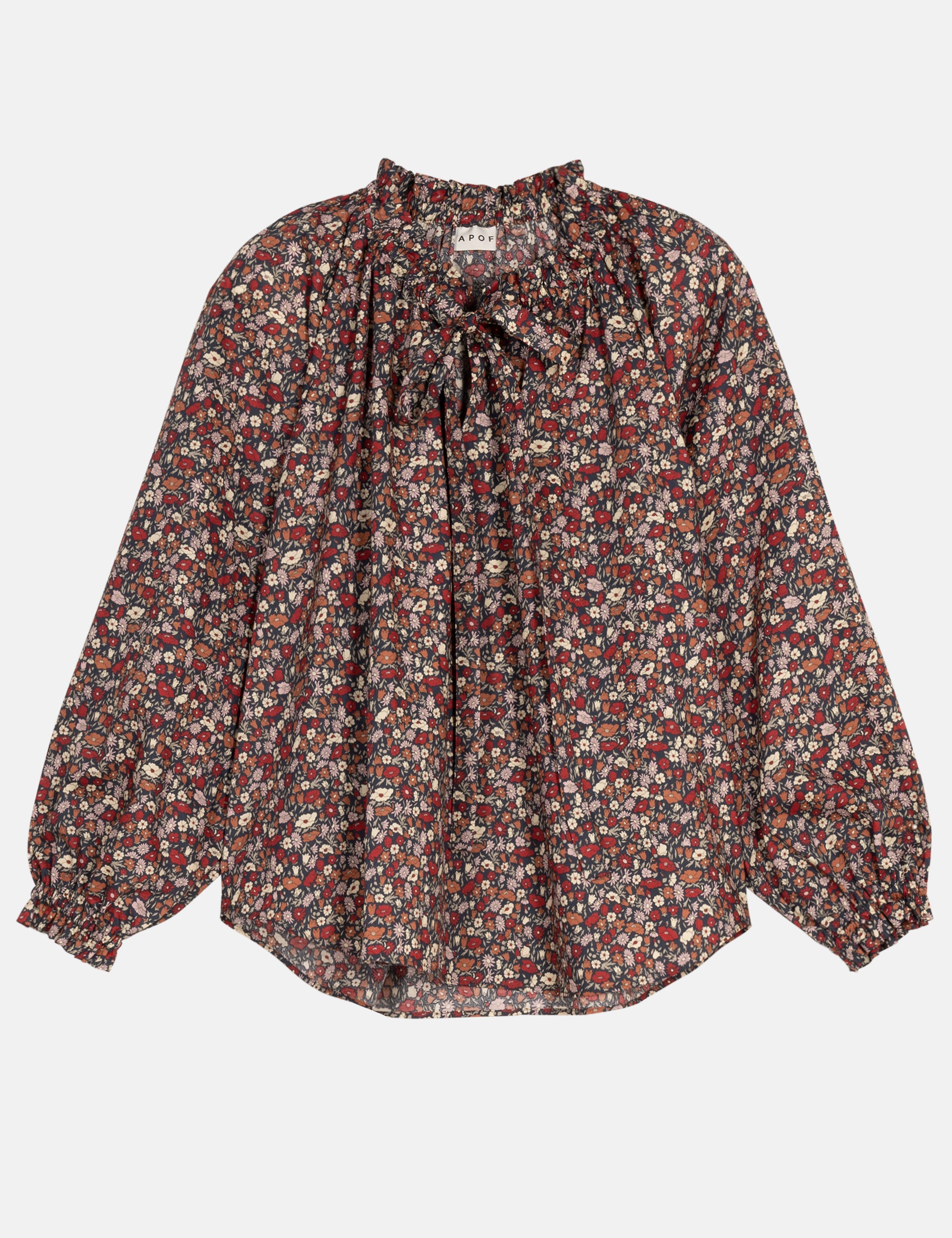 Floral blouse with bow and long sleeves on a white background