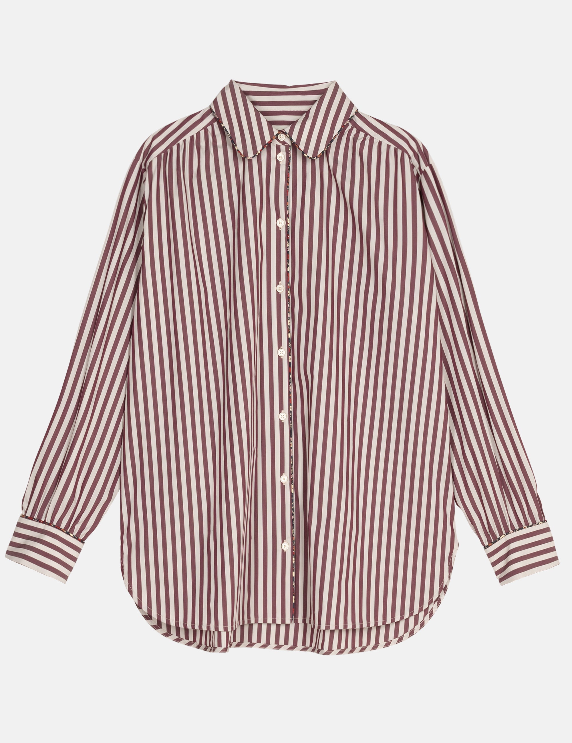 Striped women's shirt with red and white pattern on a light gray background