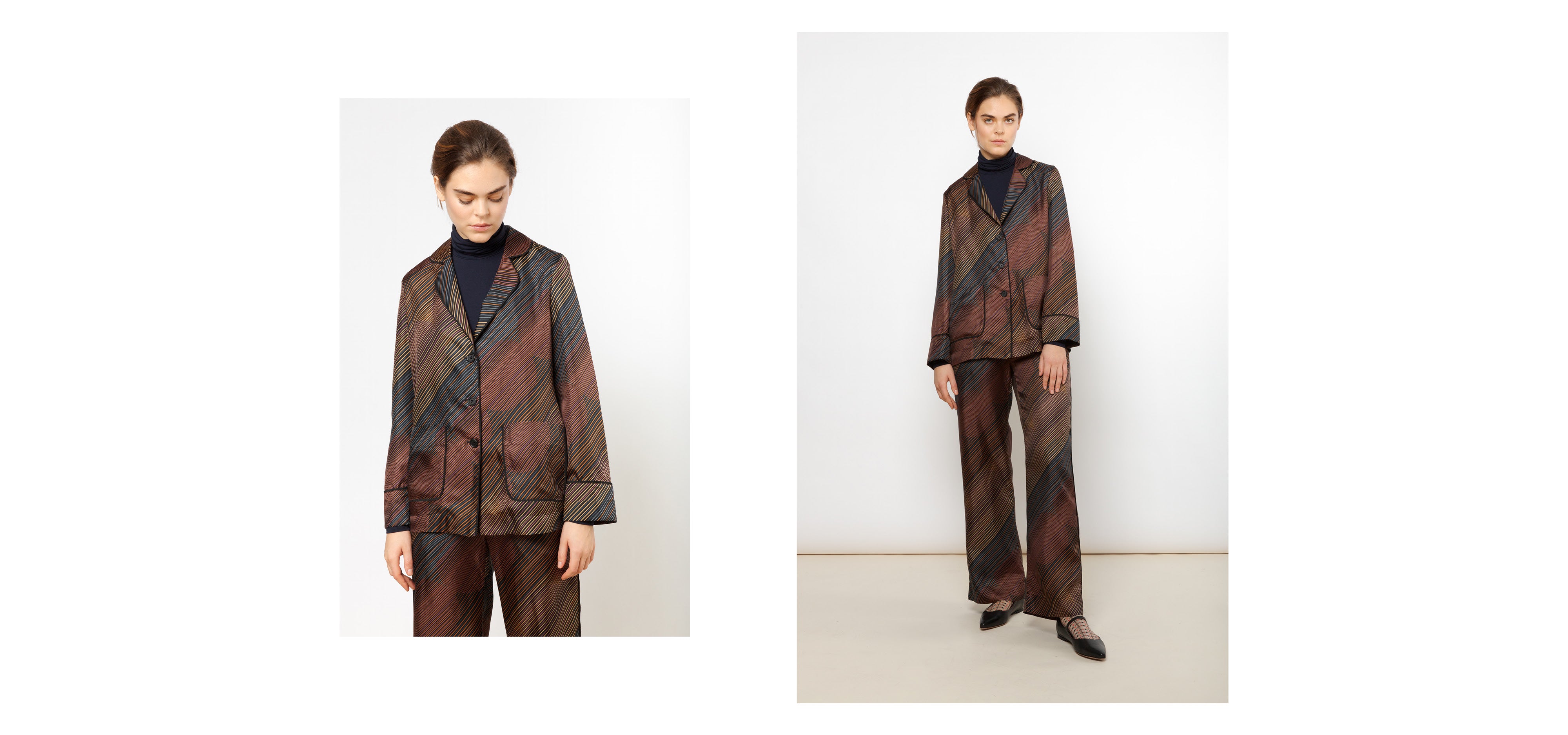 Woman in multi-colored pants and jacket with diagonal striped pattern
