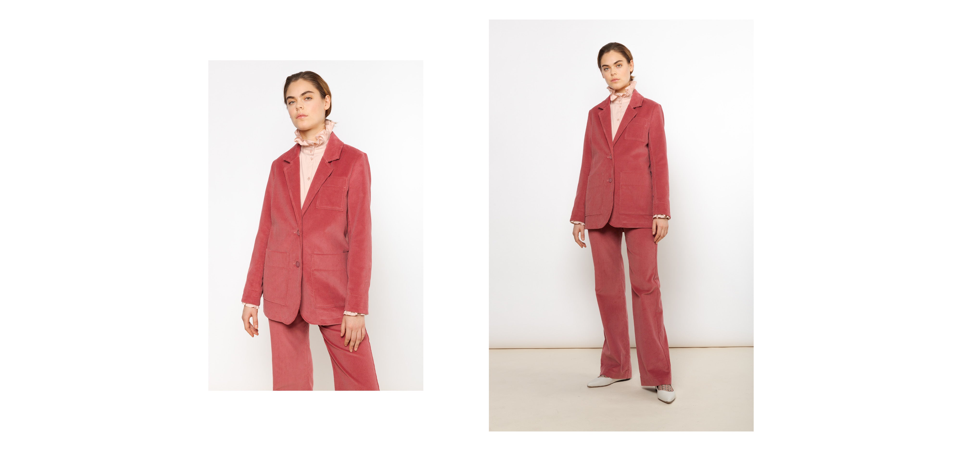 Woman in pink corduroy costume and pink shirt with frilled collar