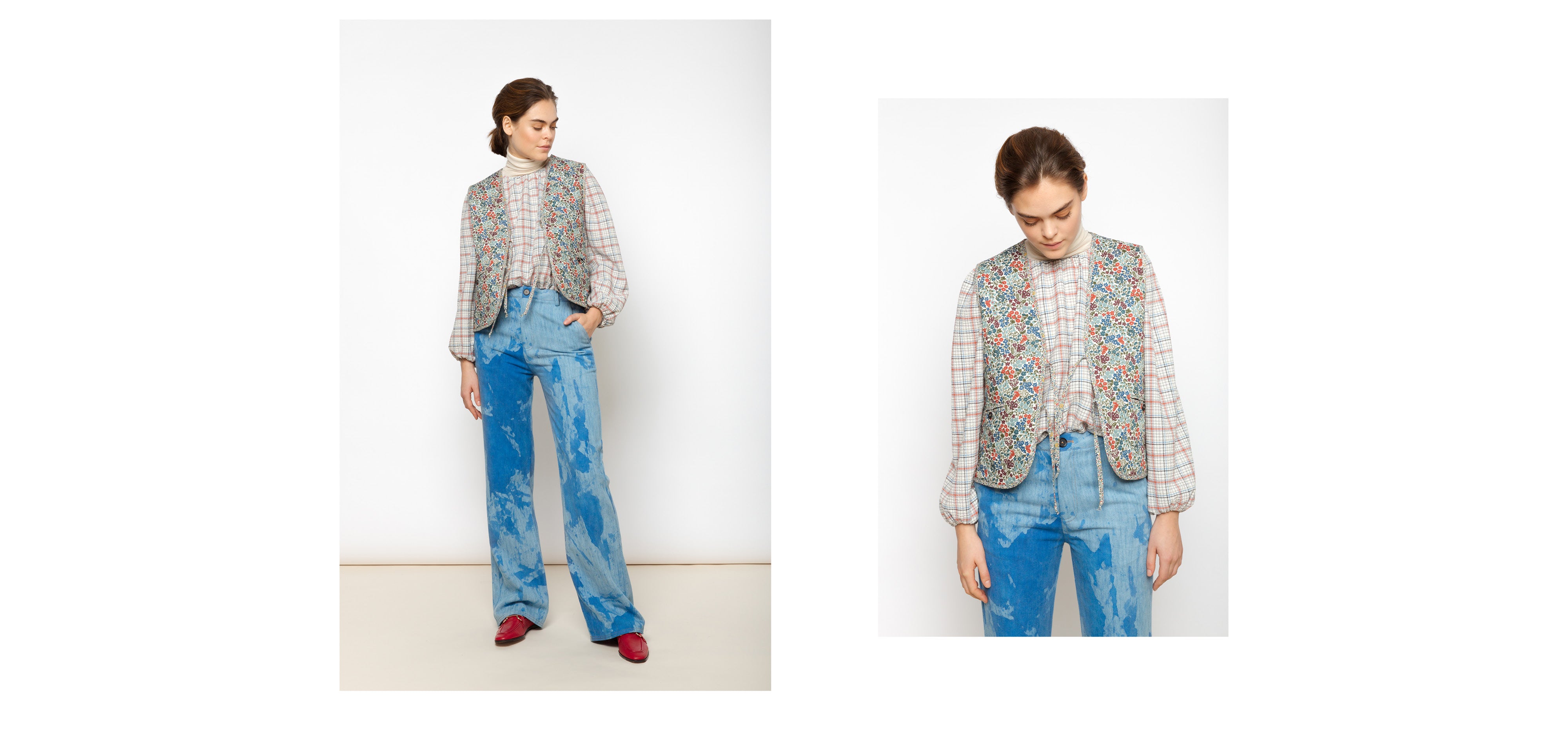 Woman in blue pants, checked long sleeve shirt and multi-colored vest with floral pattern