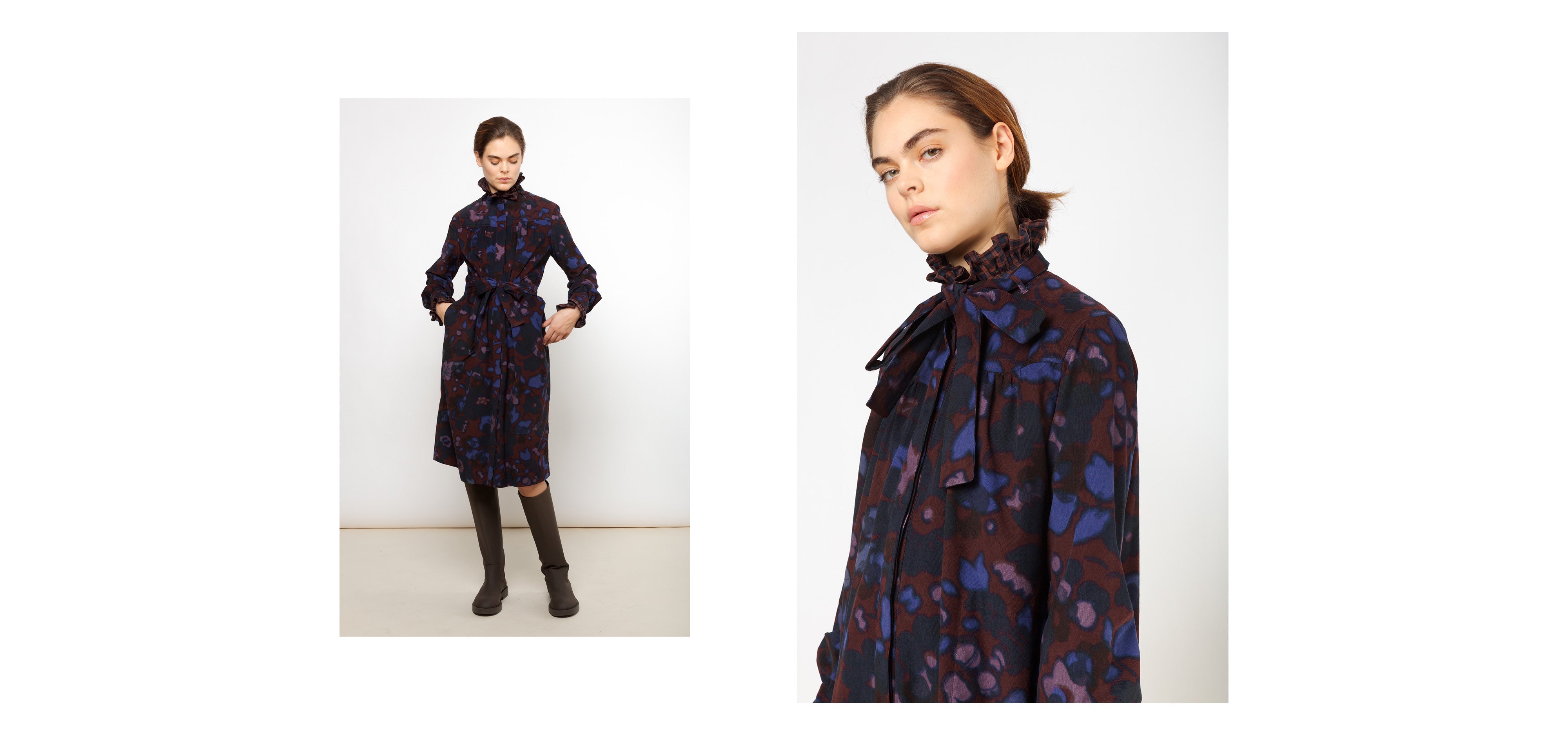 Woman in brown pink and purple midi dress with floral pattern, long sleeves and bow around neck