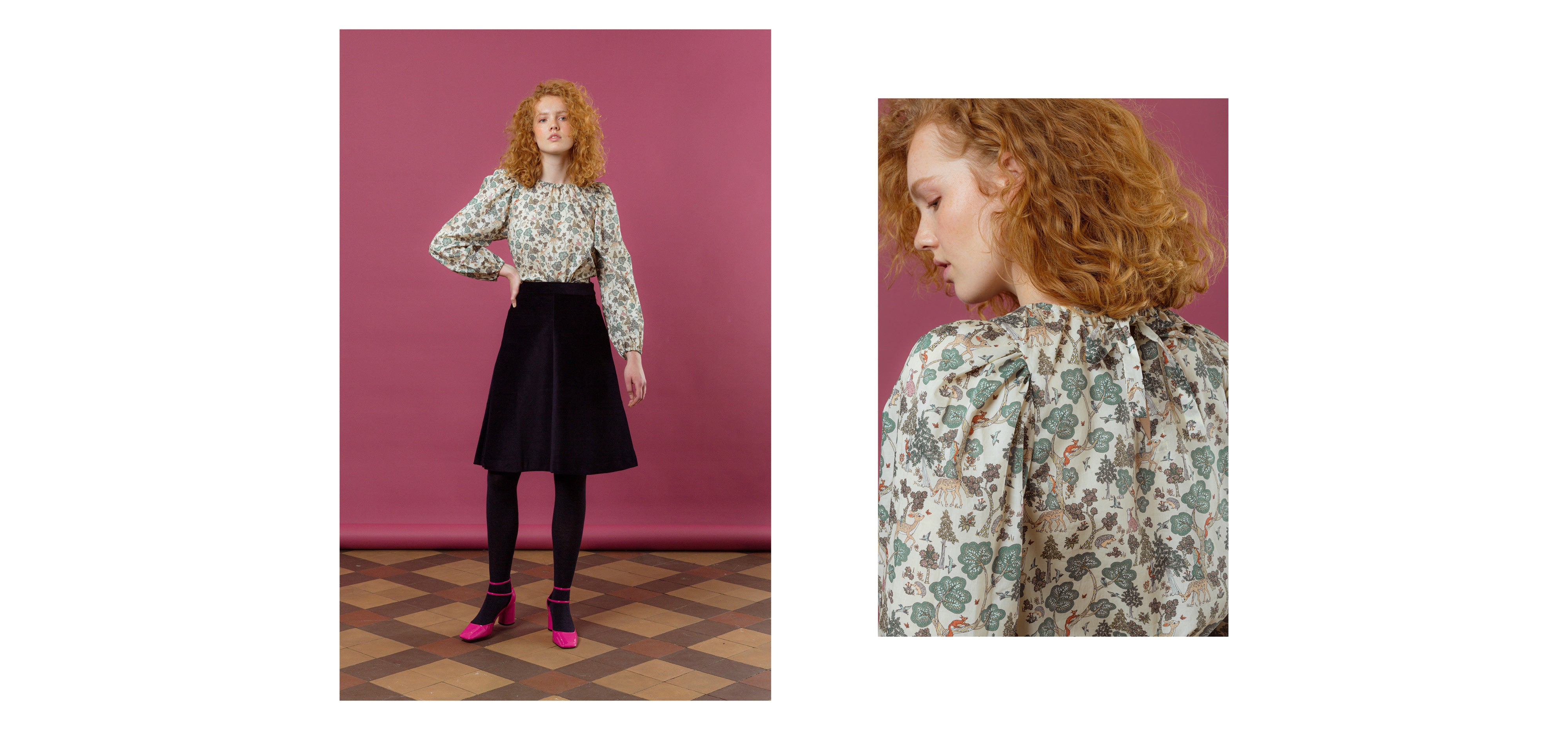 Woman in long sleeved shrt with multi-colored floral print and black skirt