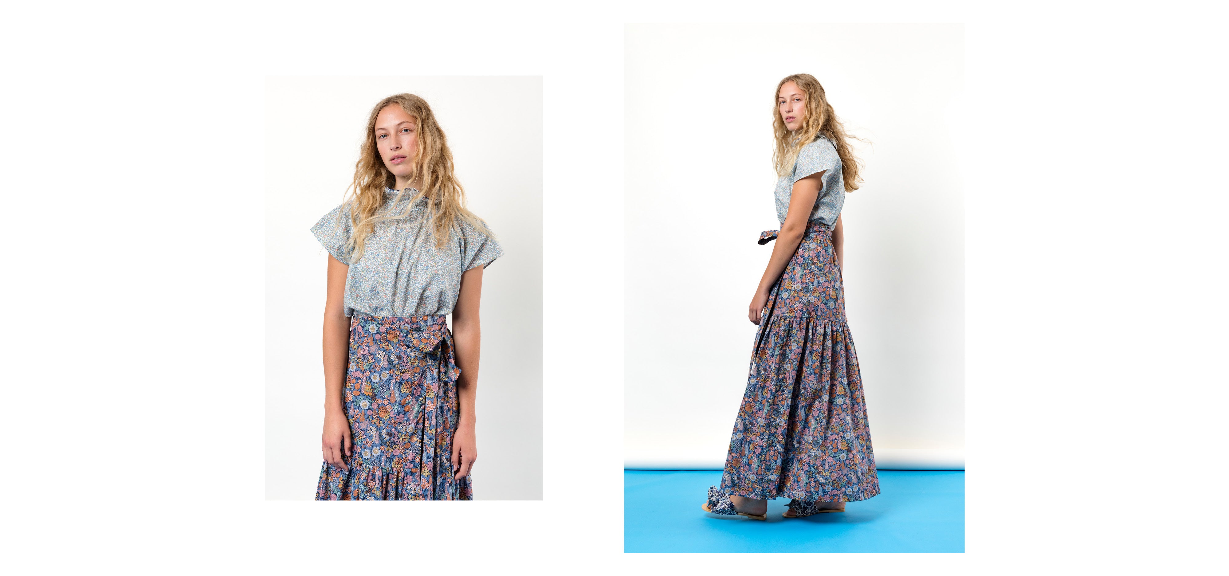 Woman in multi-colored floral patterned maxi skirt and short sleeved green shirt