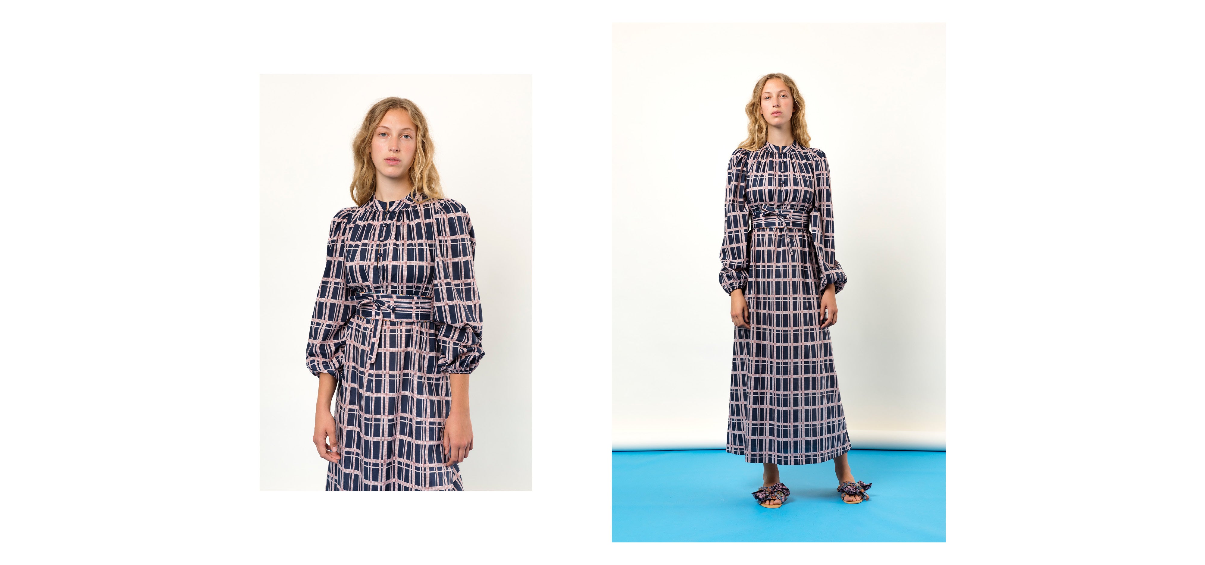 Woman in pink white and blue check patterned maxi dress with long sleeves and belt
