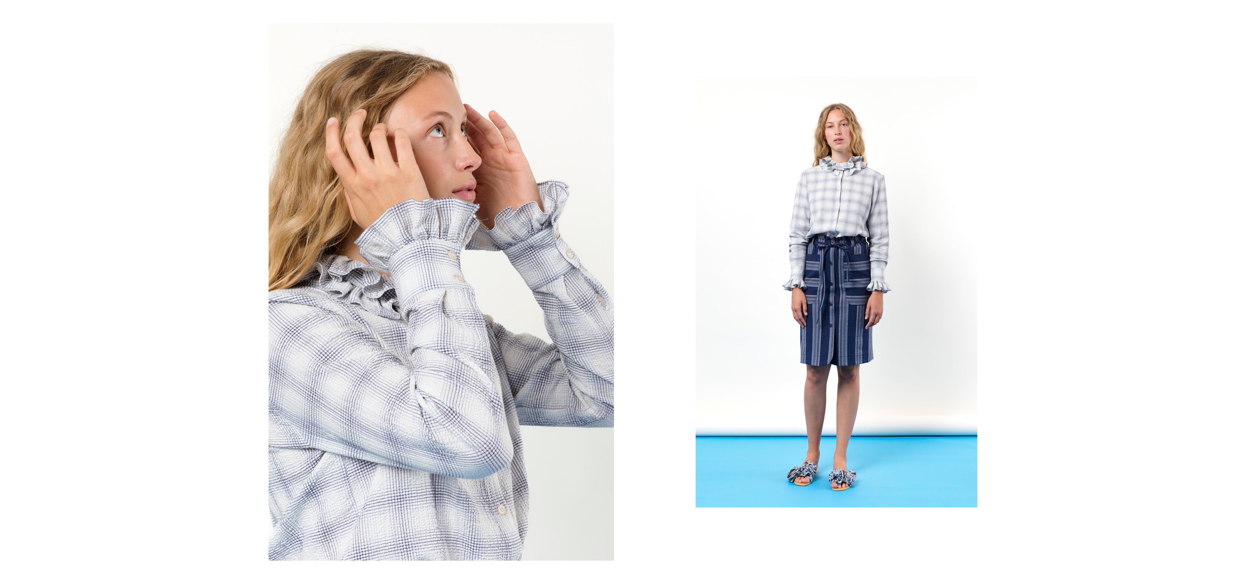 Woman in blue and white striped midi skirt with pockets and long sleeved white and grey checked shirt