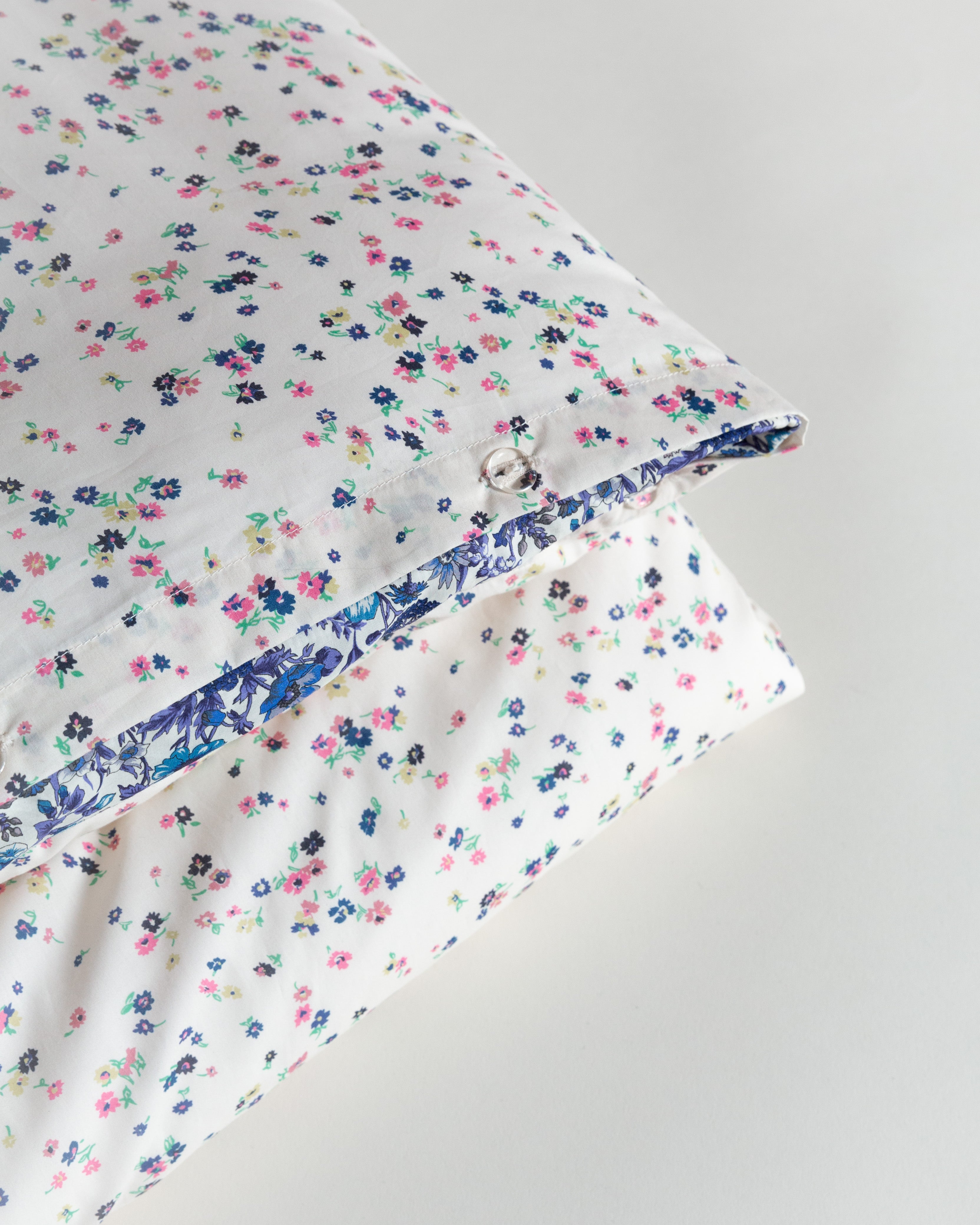 White duvet cover with multi colored flower pattern