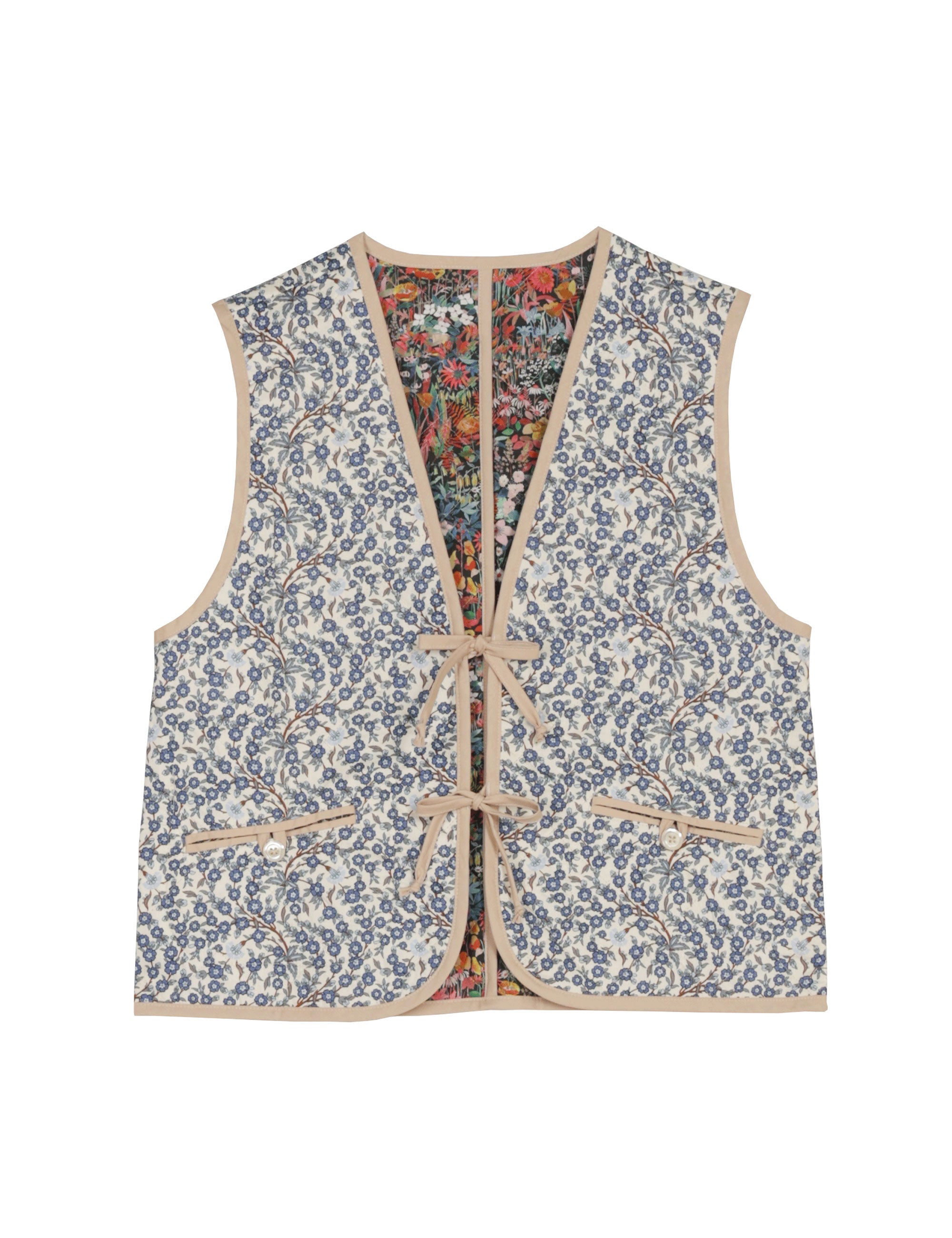 Reversible liberty cotton blue and white floral print vest with buttons, pockets and blue pipings