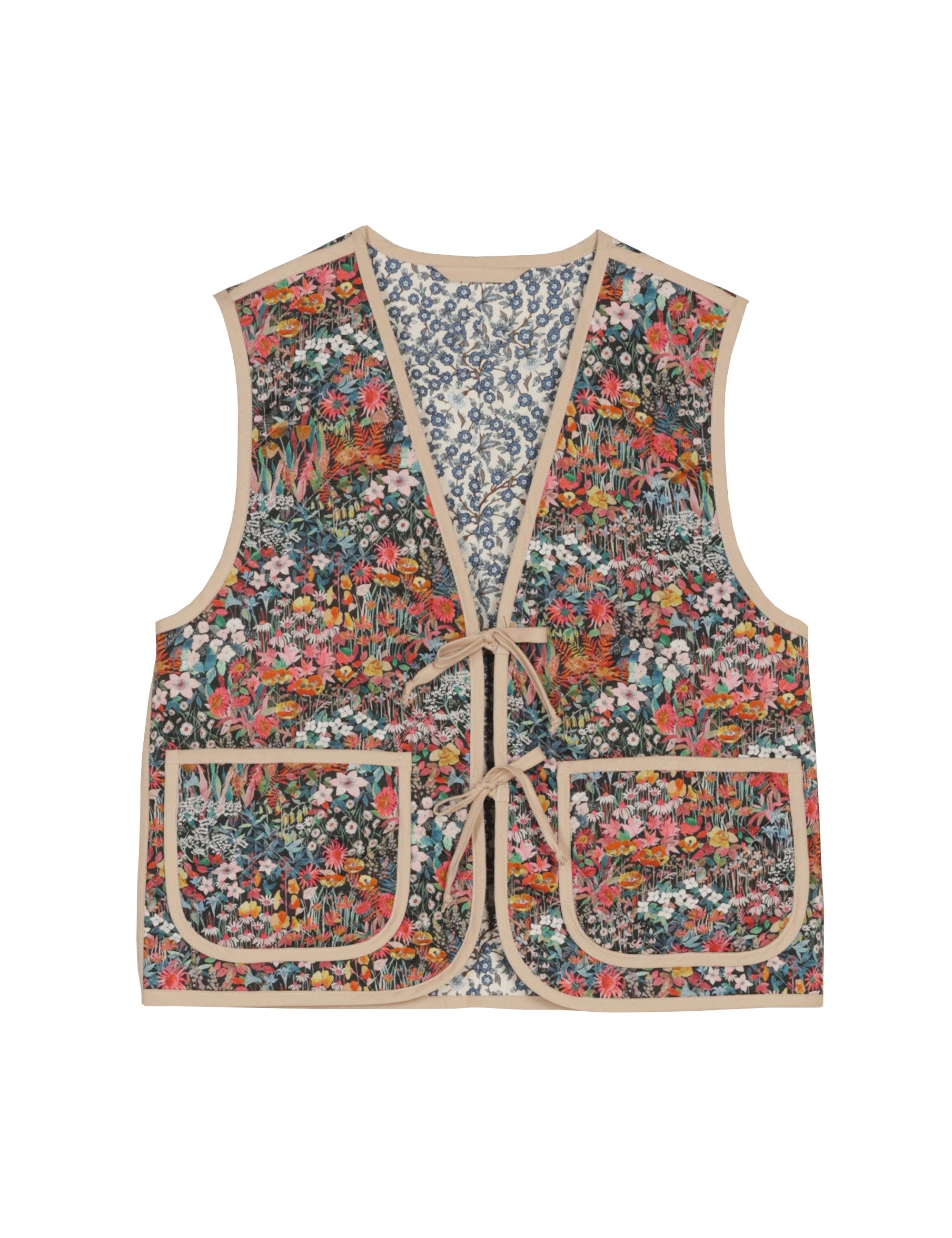 Reversible liberty cotton floral print vest with buttons, pockets and blue pipings