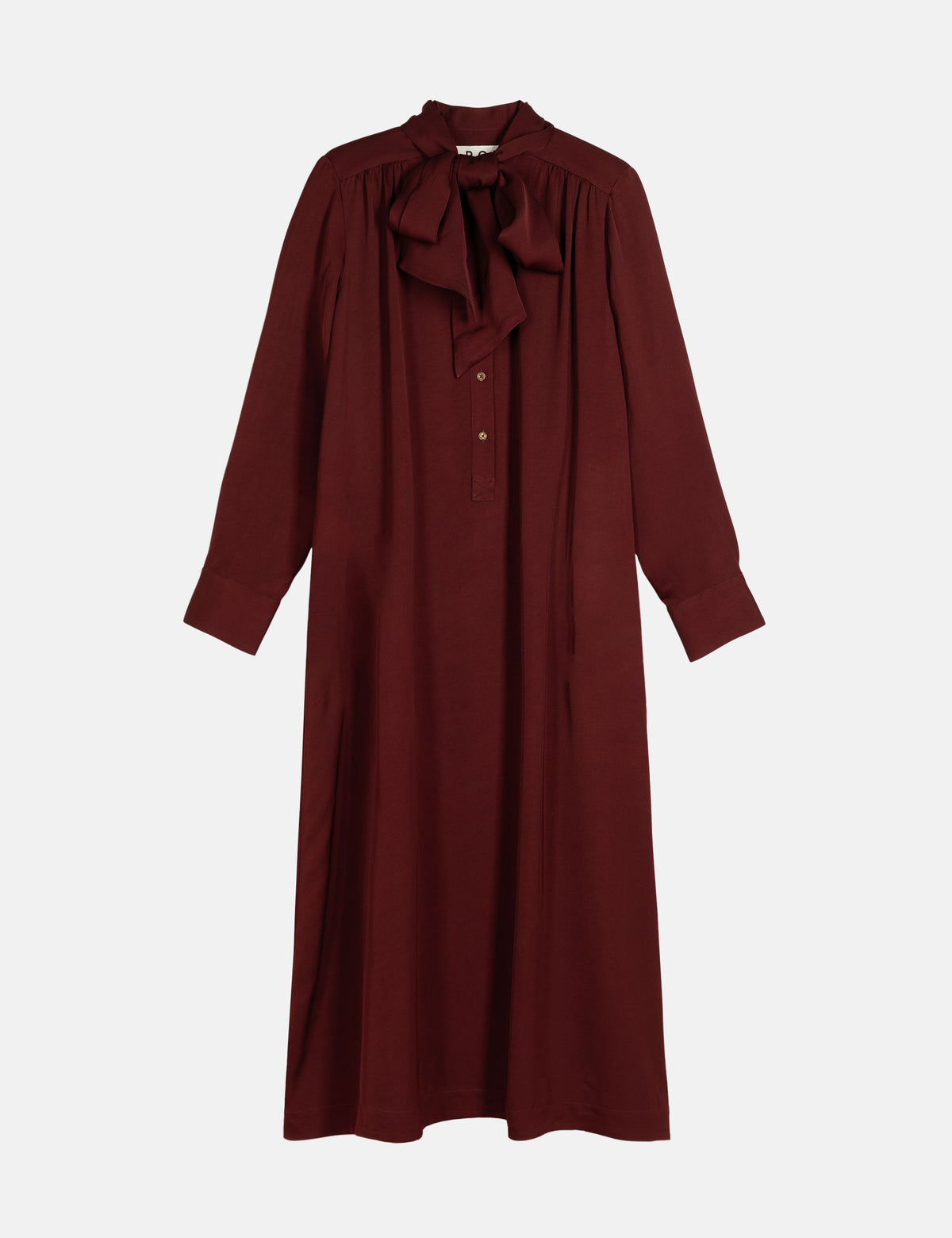 A long-sleeved burgundy dress with a high gathered collar, a large bow at the neck, and a buttoned placket, shown against a plain white background.