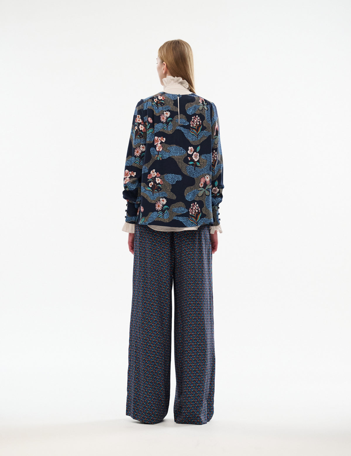 Printed long-sleeve blouse, dark navy with multicolor floral butterfly pattern, back view