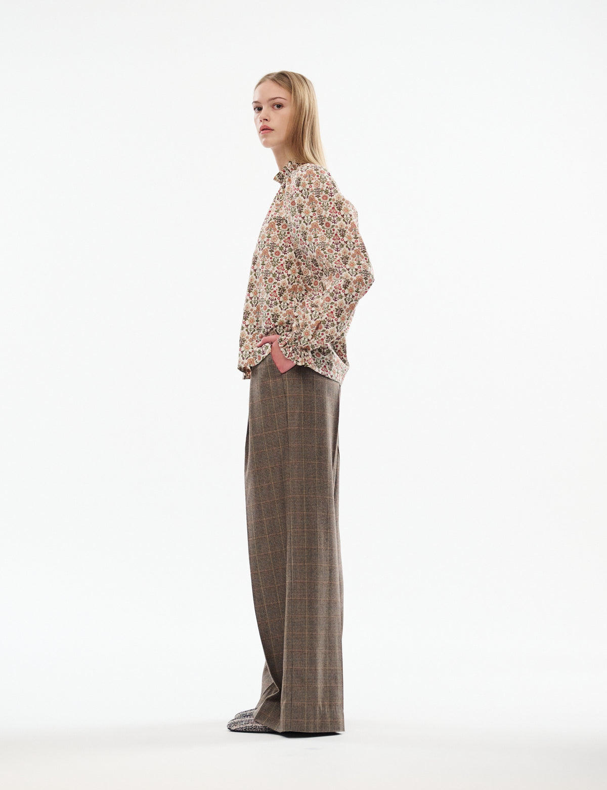 Brown plaid wide-leg trousers with a high waist and straight relaxed leg