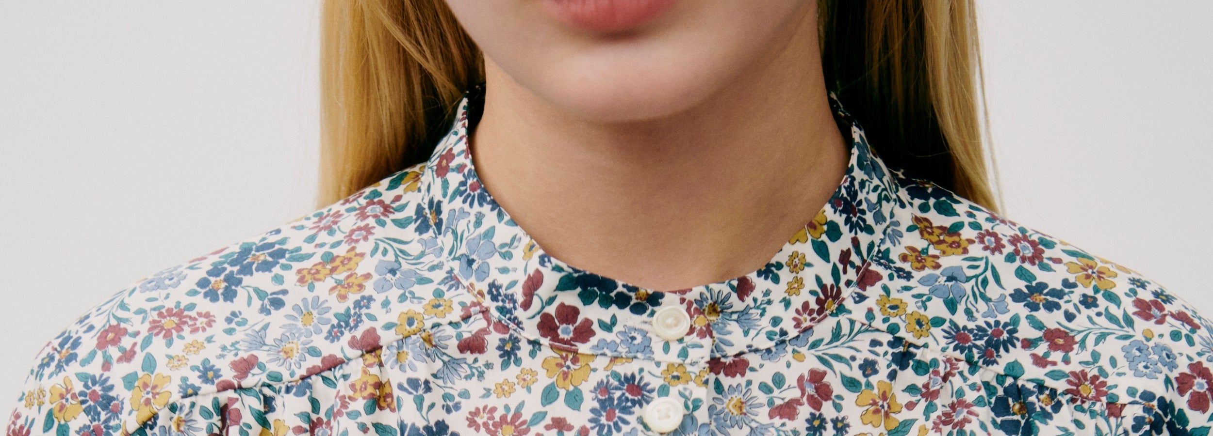 Close-up of a woman wearing a floral patterned shirt