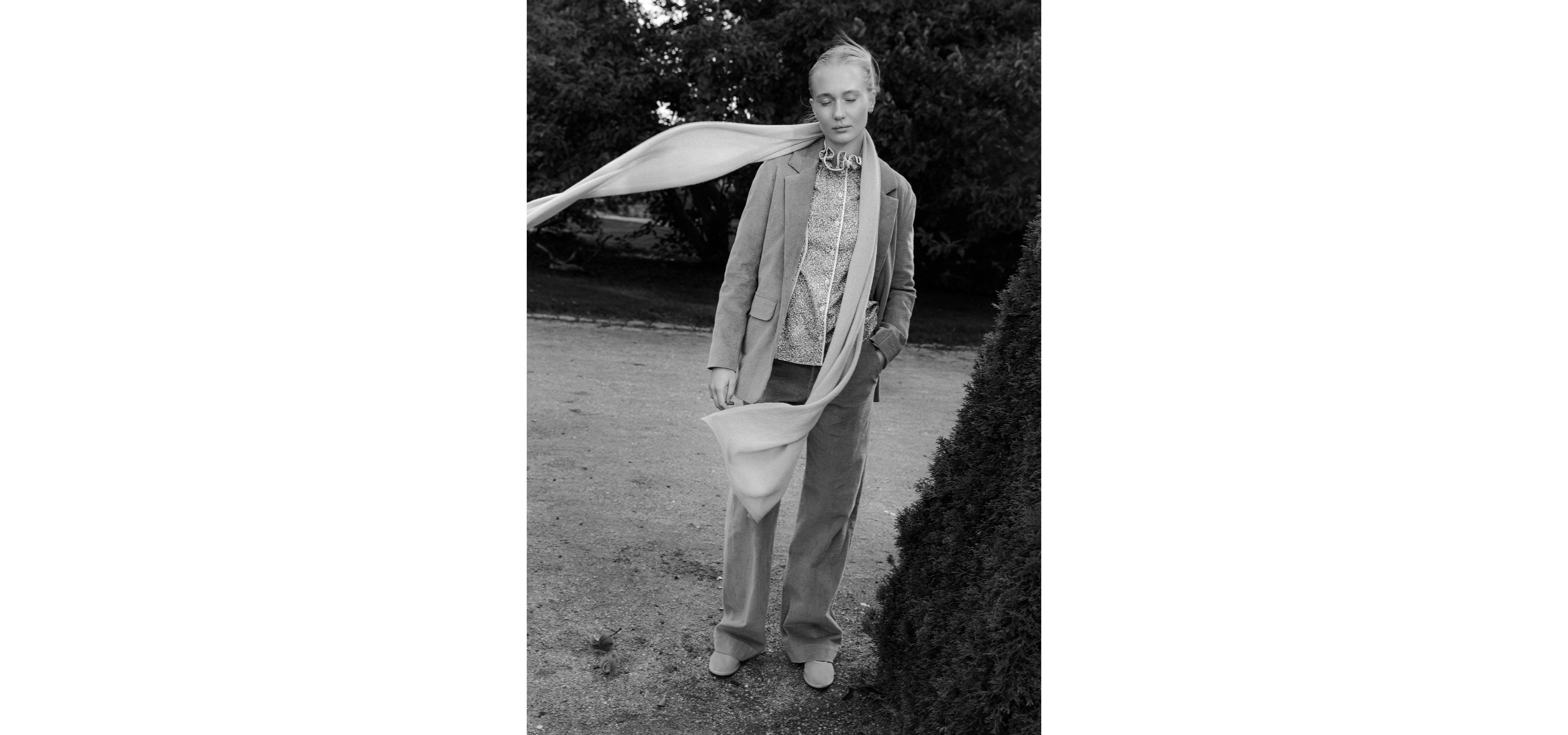 Woman in costume, long scarf and floral print Liberty cotton blouse