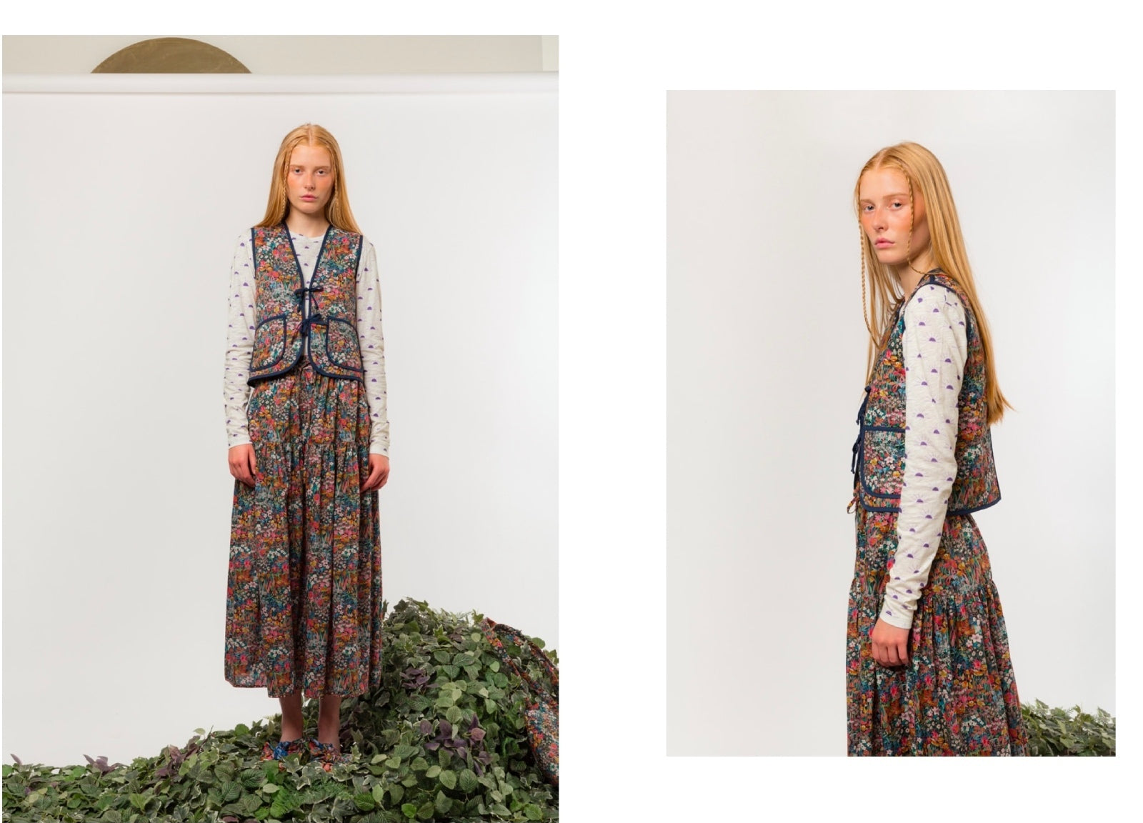 Woman wearing a floral skirt and vest  and long sleeved t-shirt