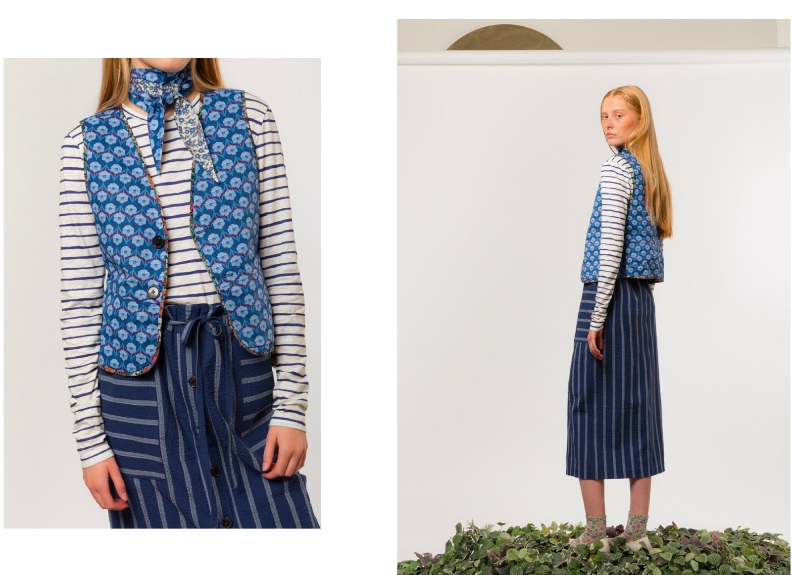 Woman wearing a blue patterned vest over a striped shirt with a blue and white striped skirt