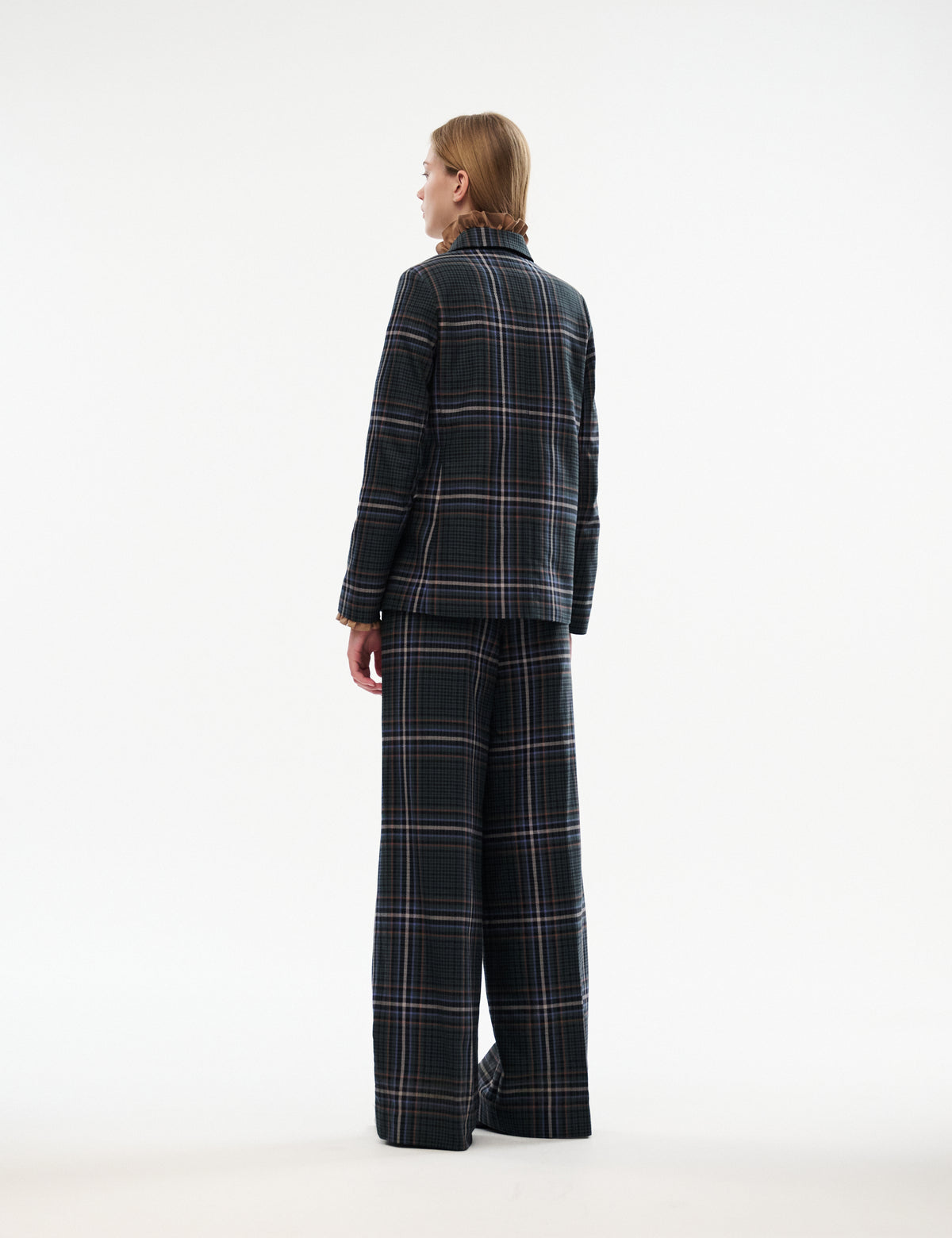 High-waisted wide-leg plaid trousers shown from the back, dark navy/green with belt loops.