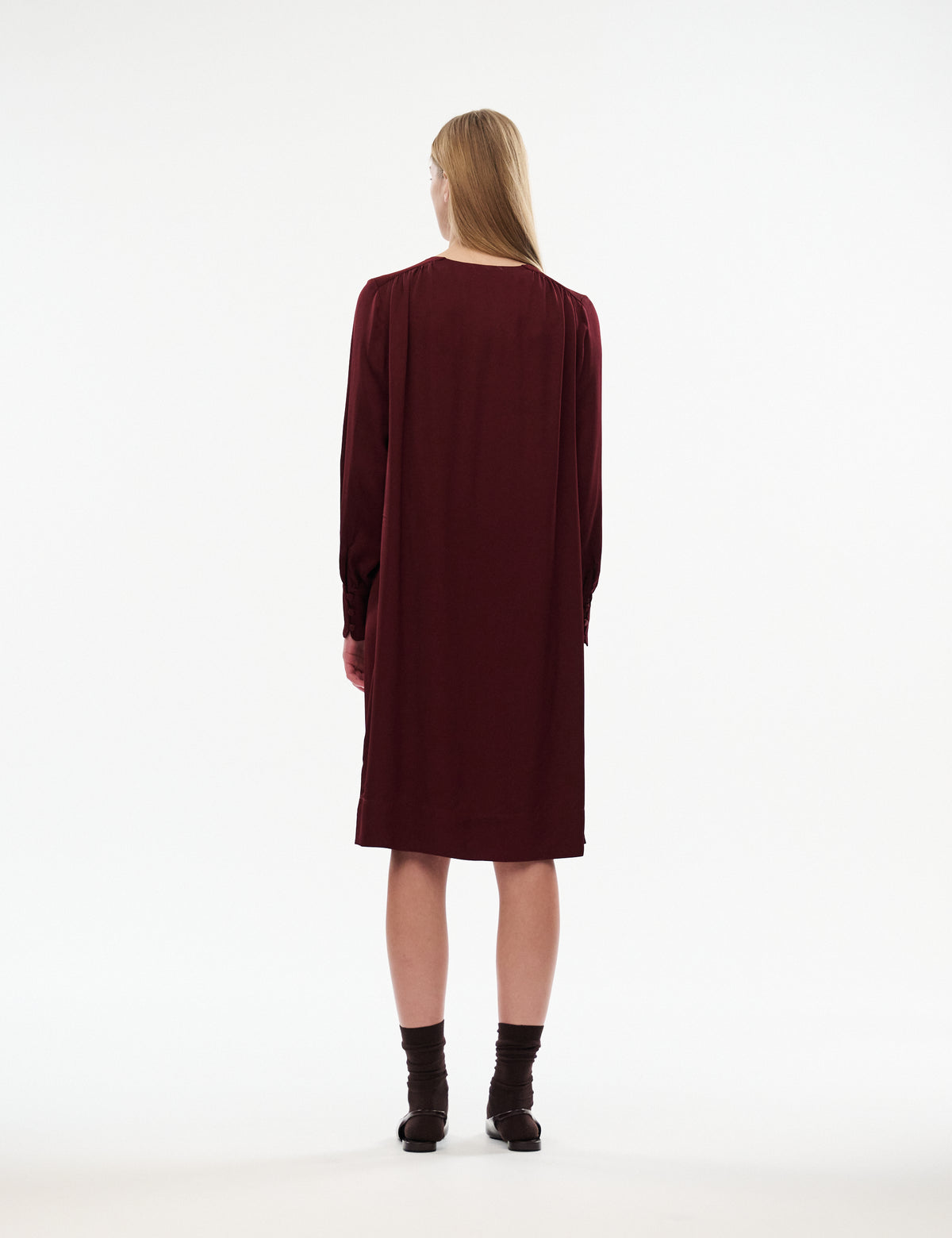 Burgundy midi dress, back view with long puff sleeves and straight relaxed fit