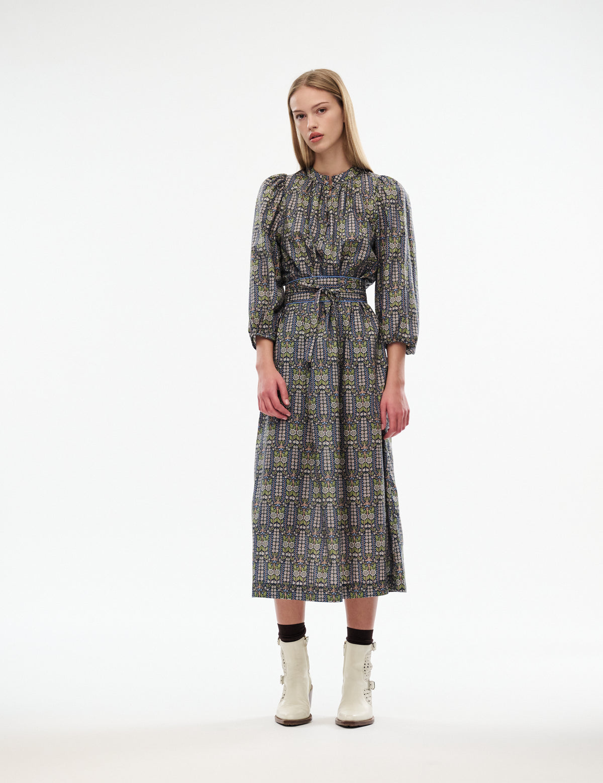 Maya midi dress with long sleeves, blue-green patterned fabric and belted waist
