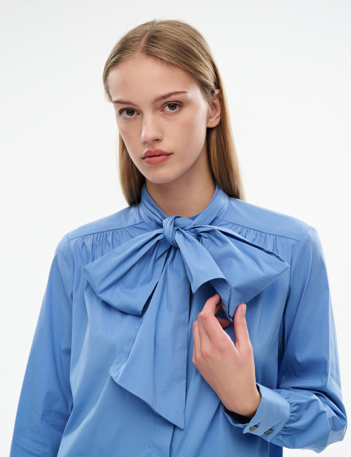 NELLE lake blue bow-neck shirt with long sleeves and buttoned cuffs