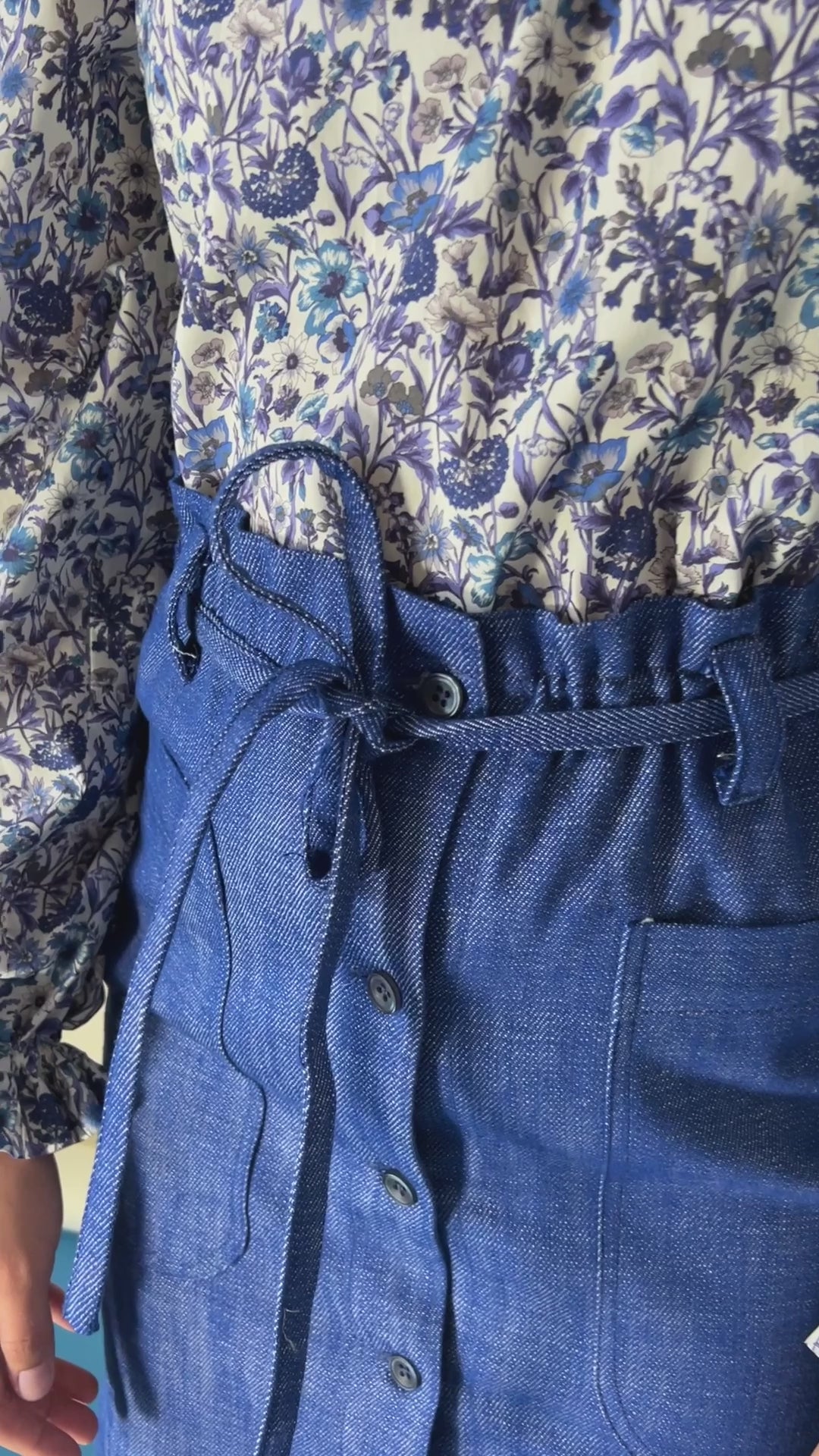 Shirt with blue flowers and blue denim skirt
