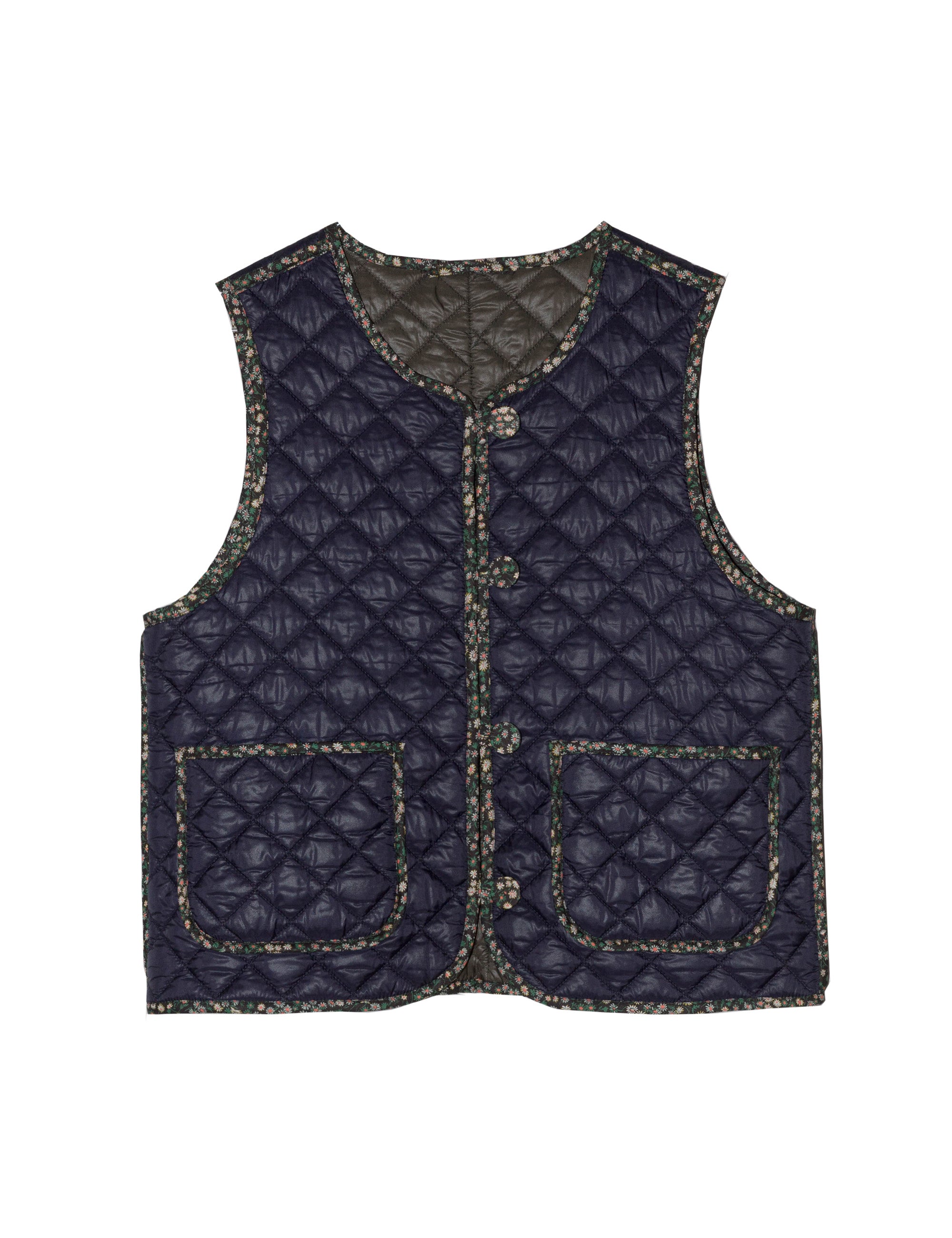 Blue quilted women's vest with pockets, buttons and floral print pipings