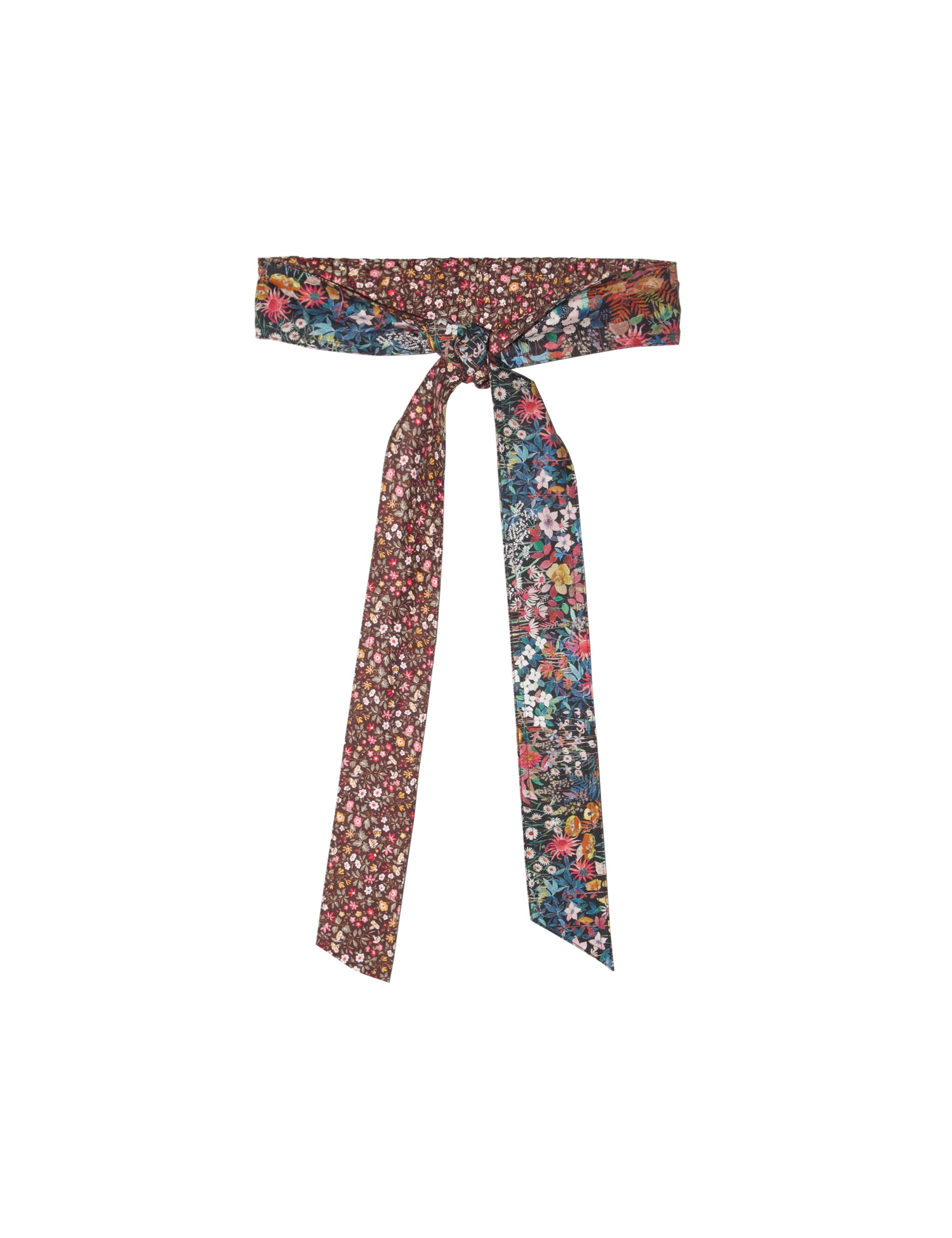 Multi-colored floral print belt tied with a knot