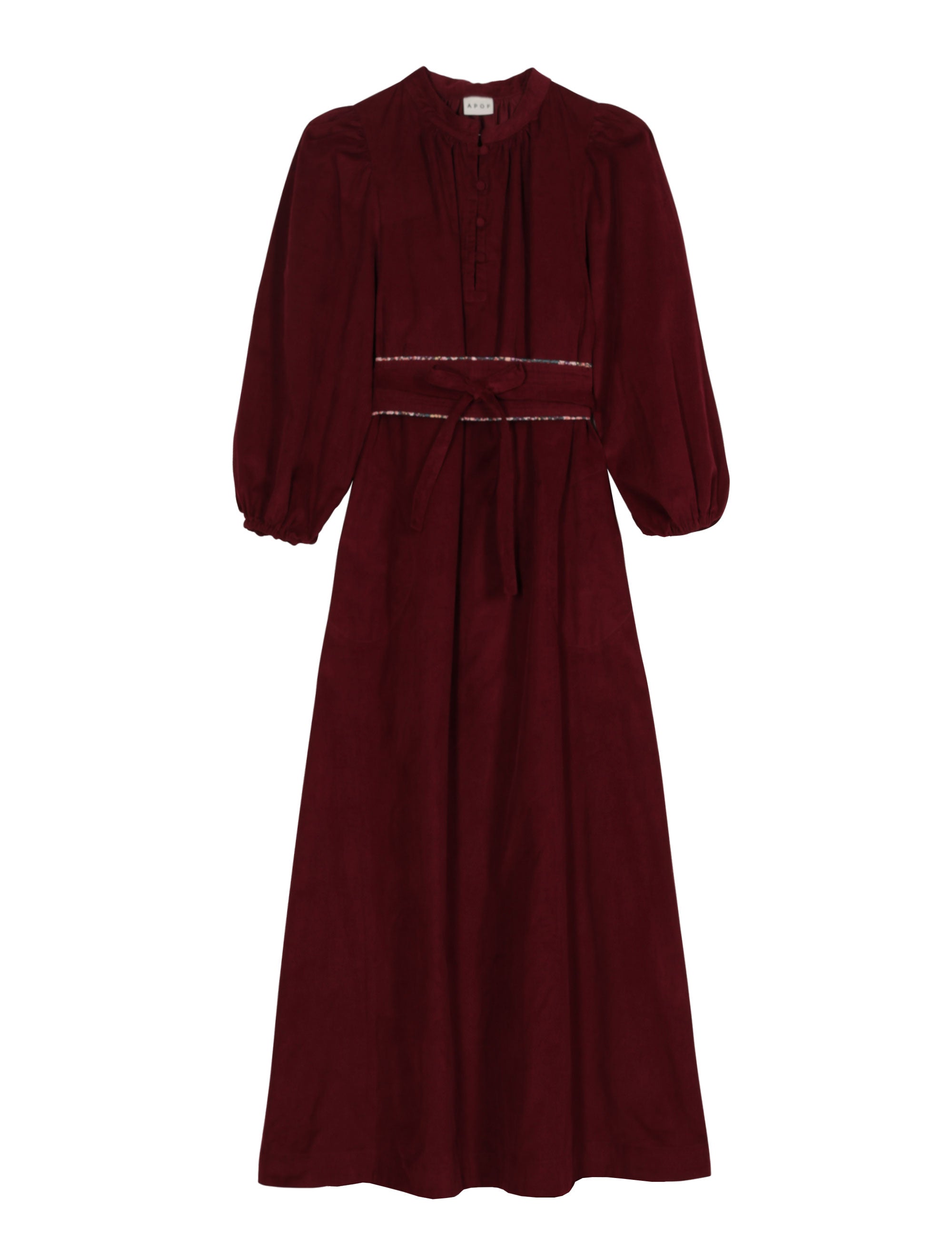 Long dark red dress in corudroy with long puff sleeves and matching fabric belt