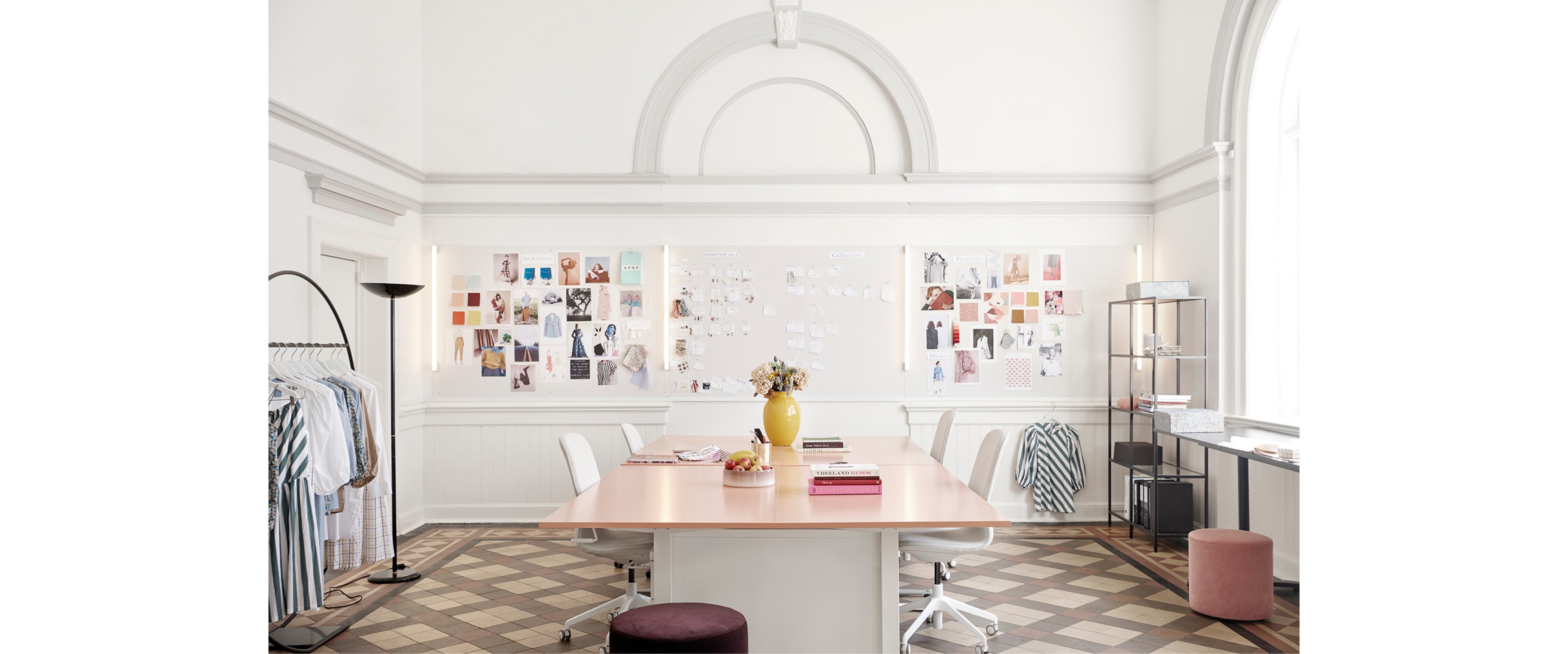 APOF studio with working table, chairs and clothes' rack