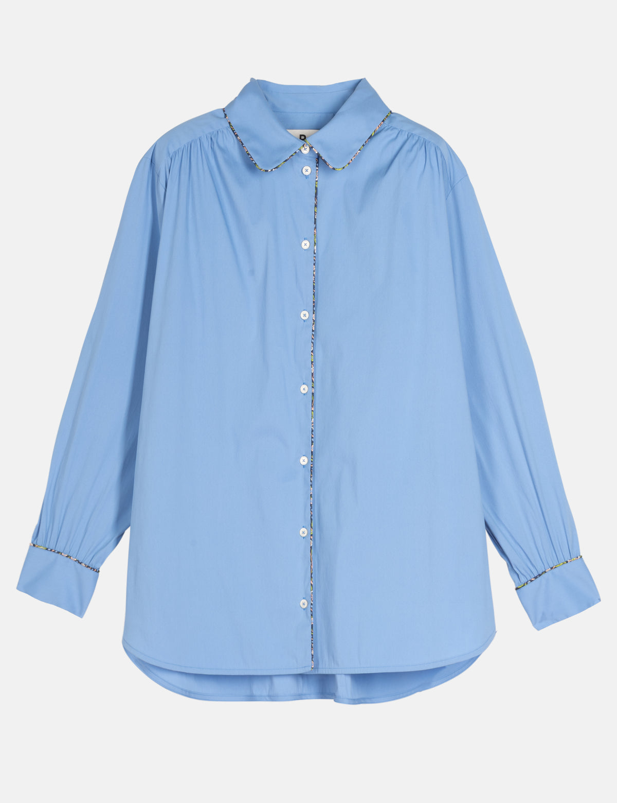Light blue button-up shirt with pointed collar and long sleeves