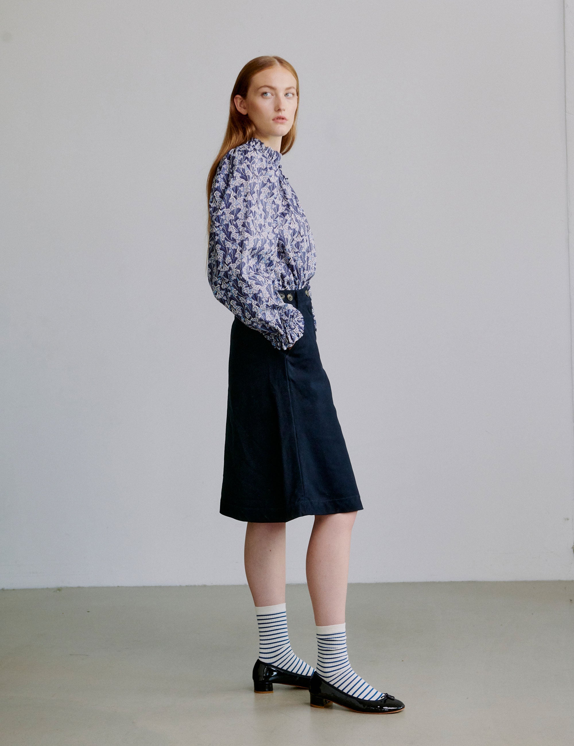 Blue Floral Blouse With Ruffle Neckline And Relaxed Fit Blue Floral Blouse With Ruffle Neckline And Relaxed Fit