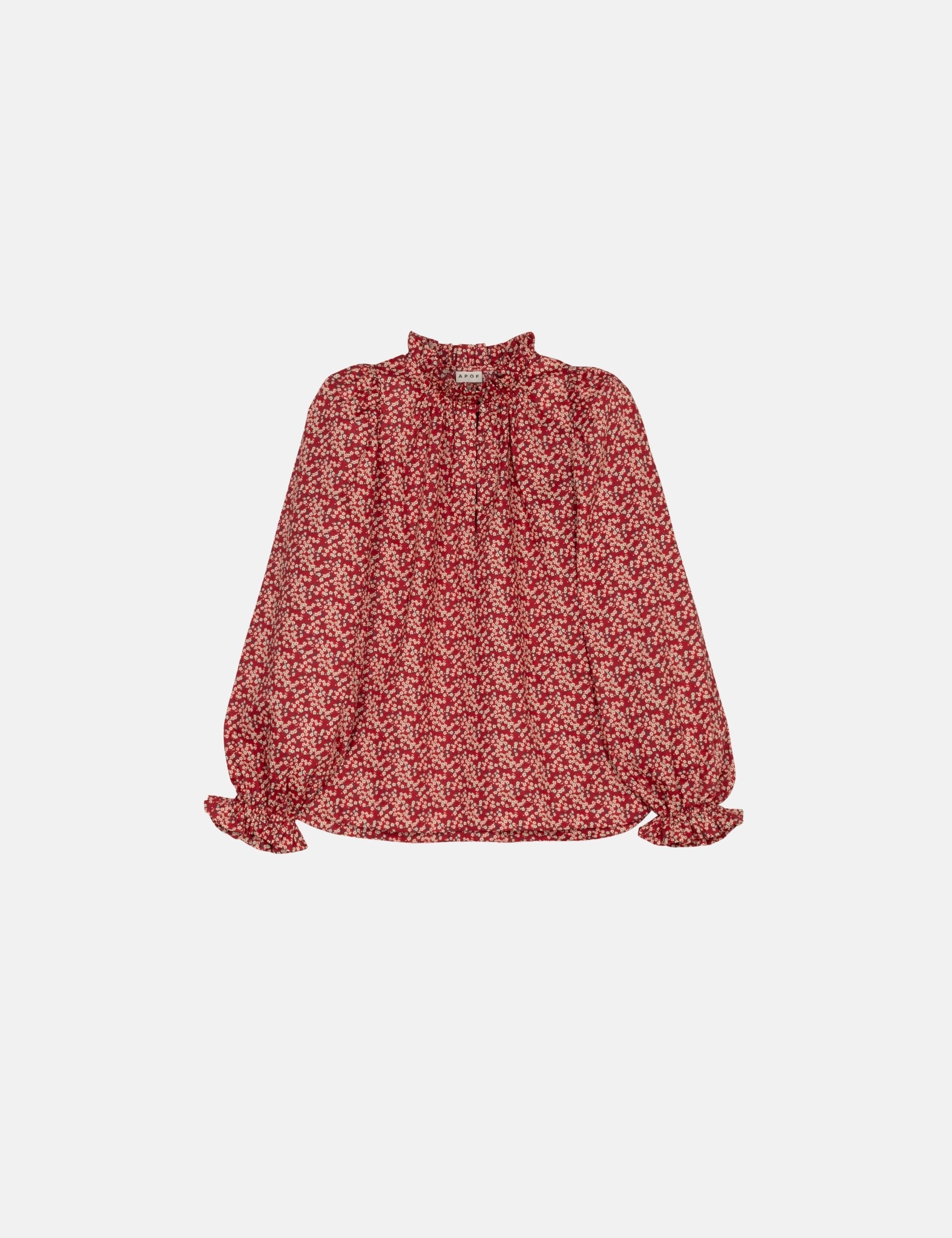 Red floral blouse on a white background