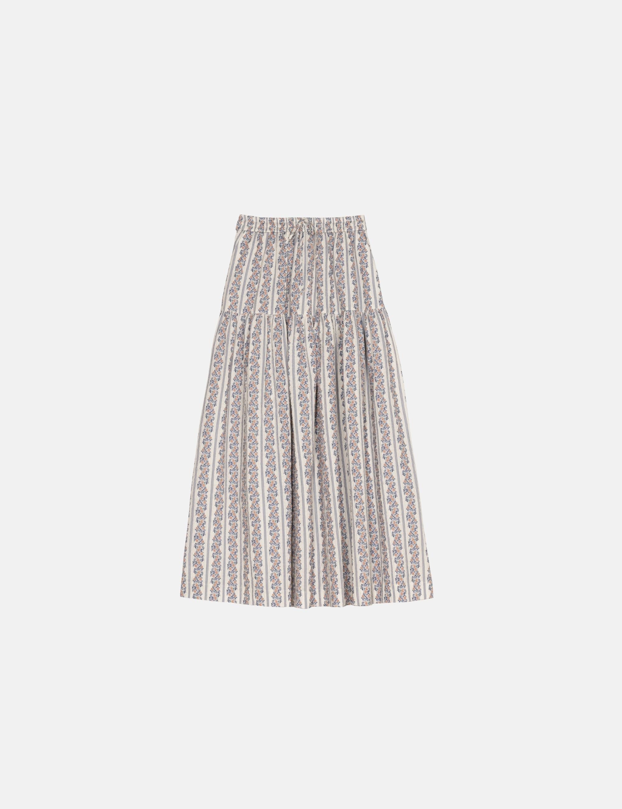 Patterned skirt on a light gray background