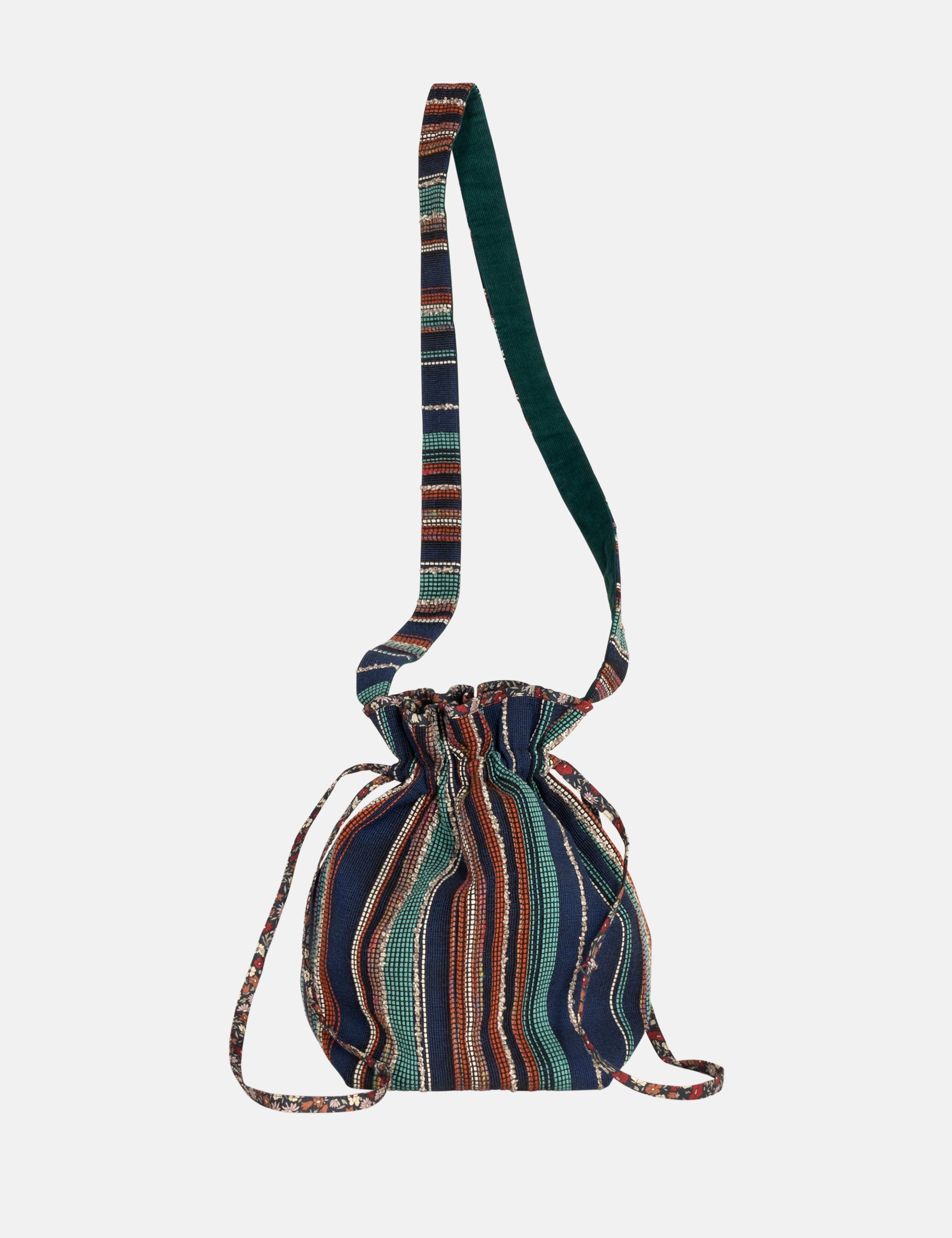 Multicolored striped drawstring crossbody bag with patterned strap on a white background