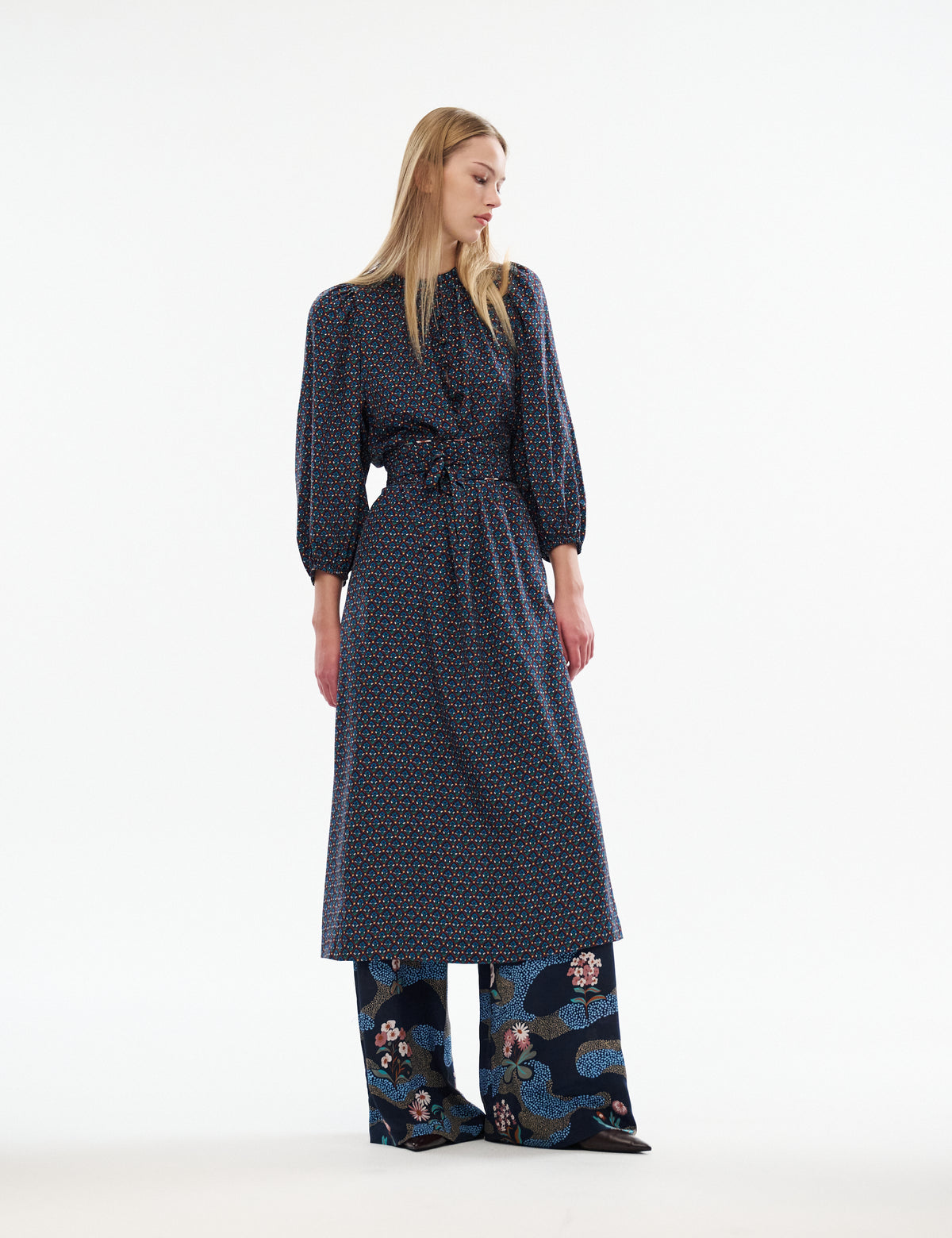 Women’s navy patterned midi dress with crew neck and tied waist belt